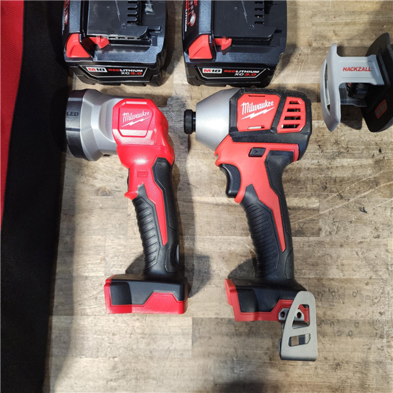 HOUSTON LOCATION - AS-IS (APPEARS LIKE NEW) M18 18-Volt Lithium-Ion Cordless Combo Kit 7-Tool with 2-Batteries  Charger and Tool Bag