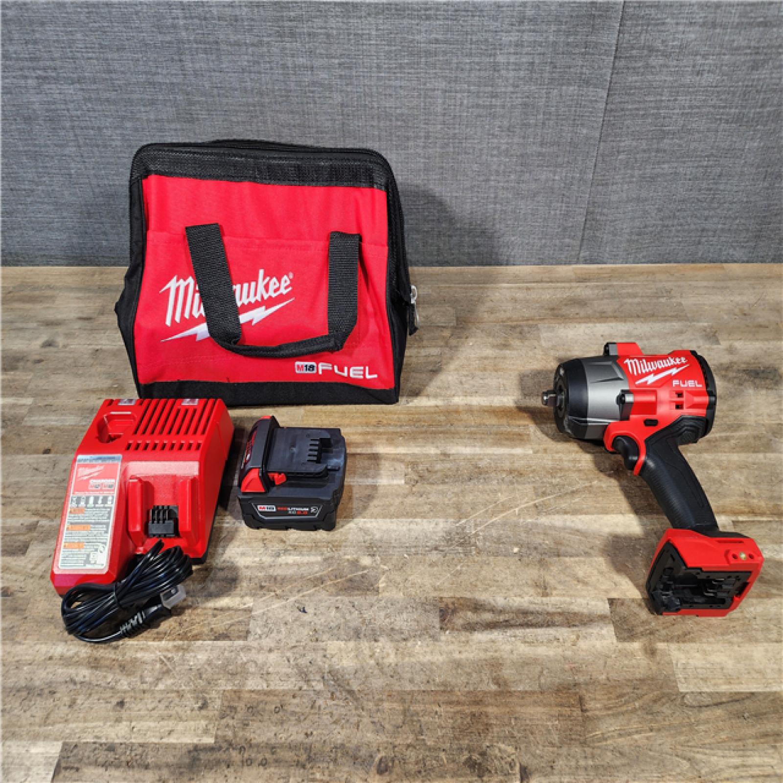HOUSTON LOCATION - AS-IS (APPEARS LIKE NEW) Milwaukee M18 1/2 in. Cordless Brushless High Torque Impact Wrench Kit (Battery & Charger)