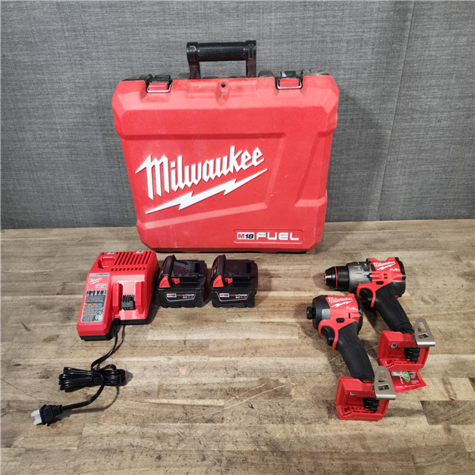 HOUSTON LOCATION - AS-IS Milwaukee M18 FUEL 18V Lithium-Ion Brushless Cordless Hammer Drill and Impact Driver Combo Kit