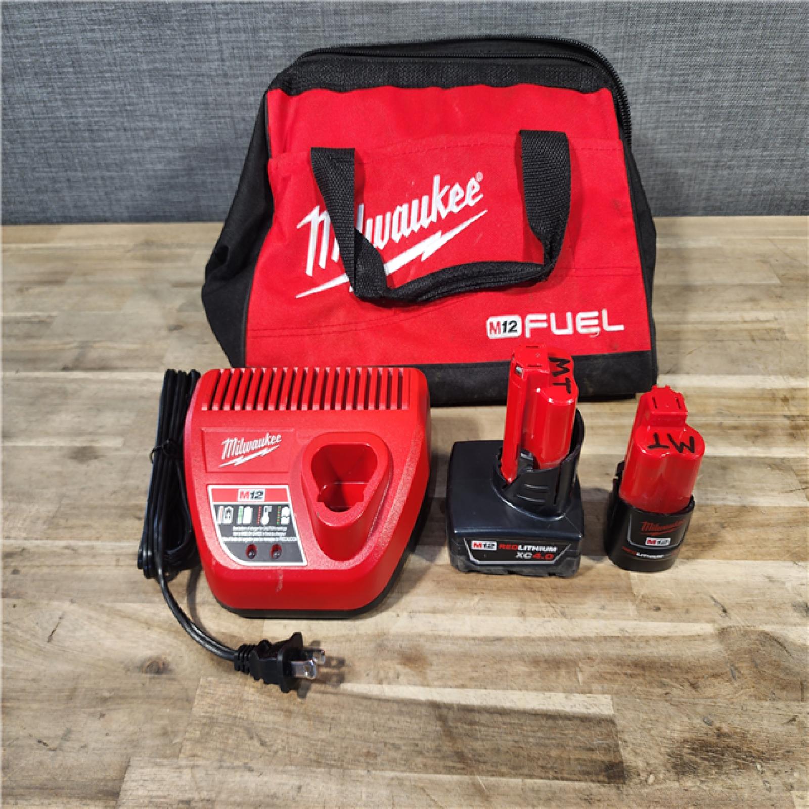 HOUSTON LOCATION - AS-IS Milwaukee 2 Tool Combo Kit W/ (2) Battery & Charger