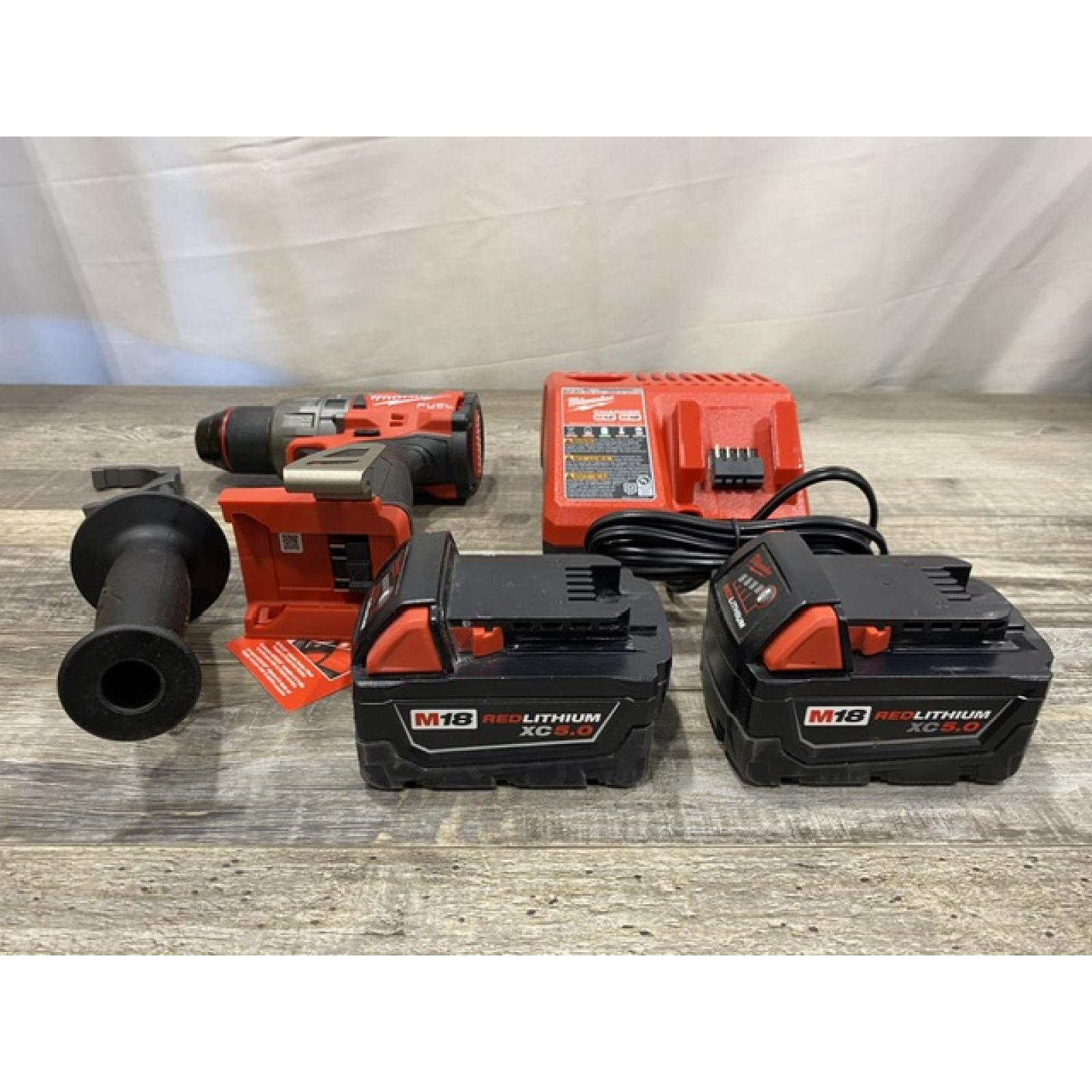 AS-IS Milwaukee FUEL 18V Lithium-Ion Brushless Cordless 1/2 in. Hammer Drill Driver Kit