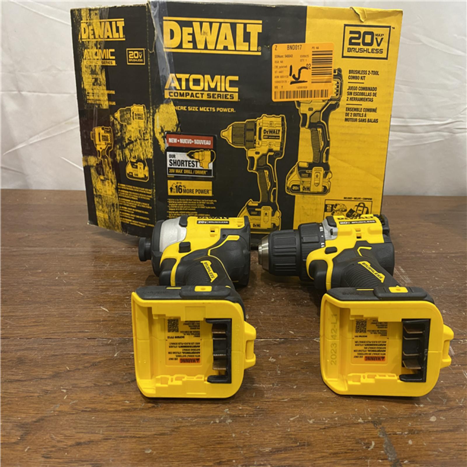 AS-IS Dewalt DCK225D2 20V MAX ATOMIC Brushless Compact Lithium-Ion 1/2 in. Cordless Drill Driver and 1/4 in. Impact Driver Combo Kit with 2 Batteries 2 Ah