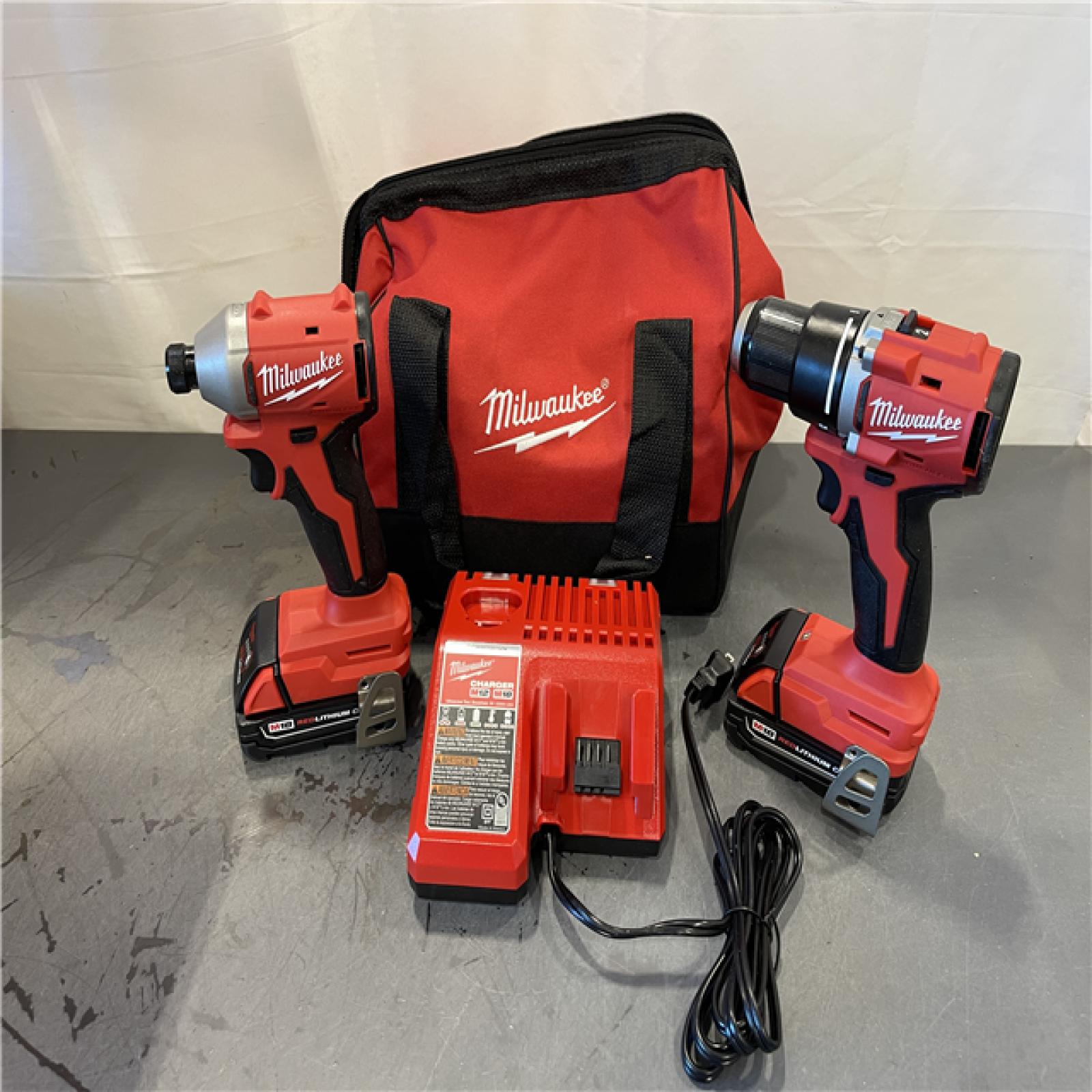 AS-IS - Milwaukee M18 18V Lithium-Ion Brushless Cordless Compact Drill/Impact Combo Kit