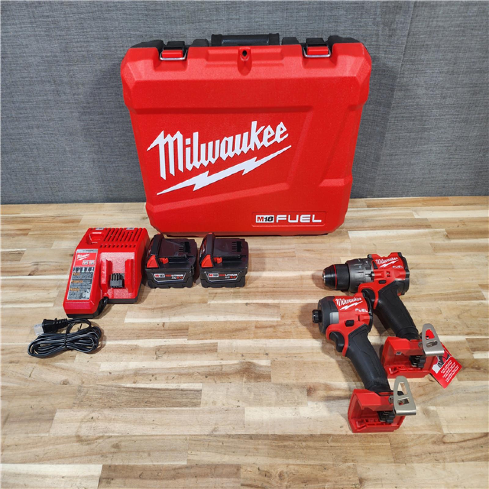 HOUSTON LOCATION - AS-IS (APPEARS LIKE NEW) Milwaukee FUEL 18V Lithium-Ion Brushless Cordless Hammer Drill and Impact Driver Combo Kit