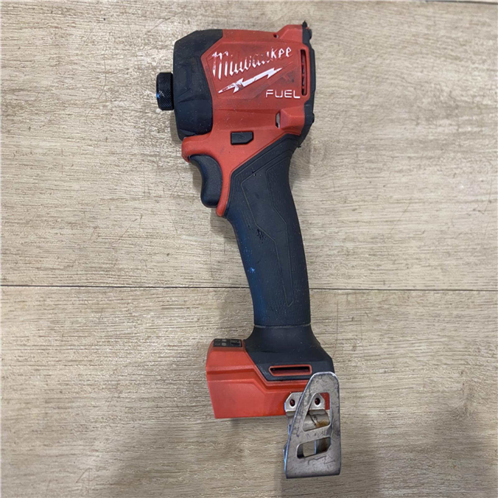 AS-IS Milwaukee FUEL SURGE 18V Lithium-Ion Brushless Cordless 1/4 in. Hex Impact Driver (Tool-Only)