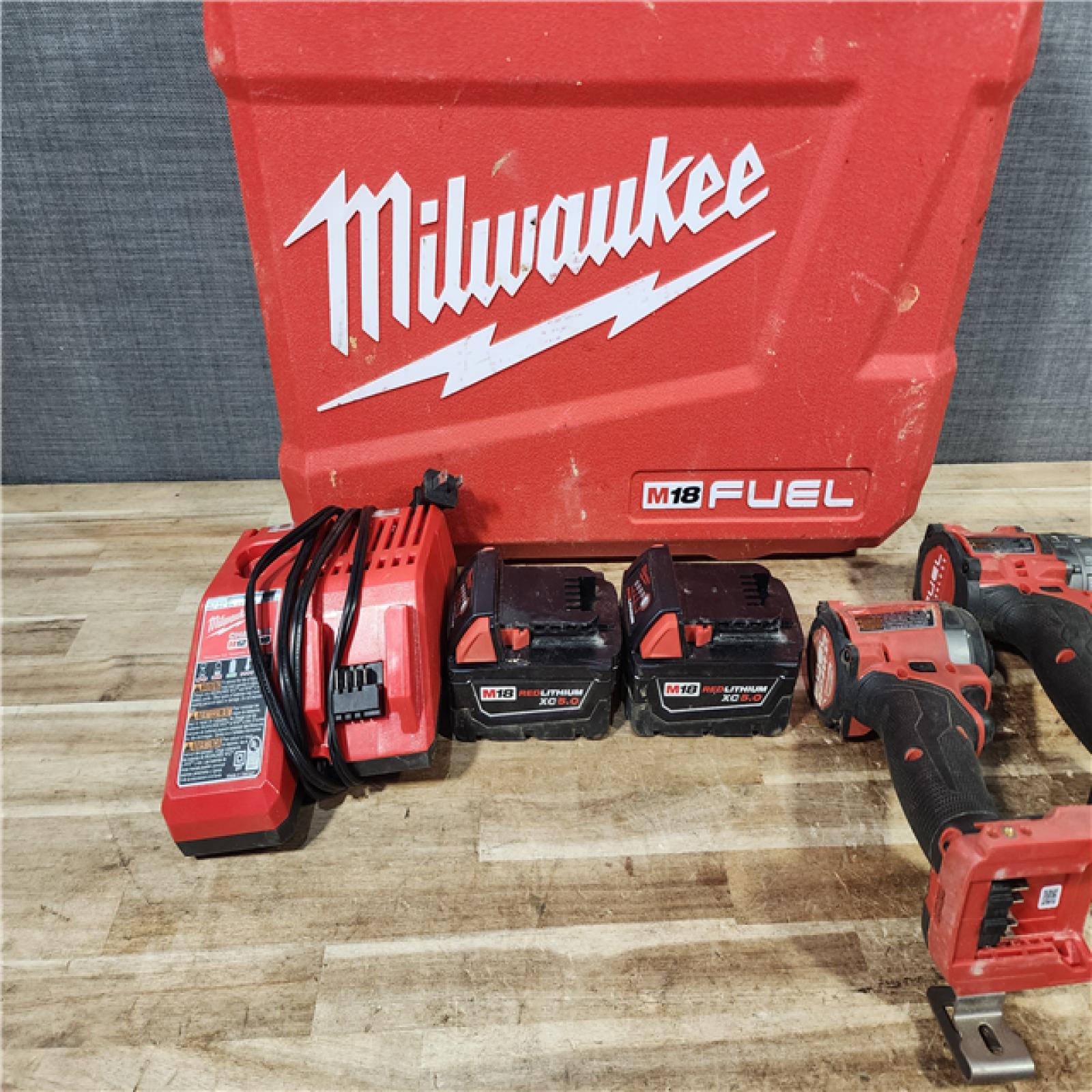HOUSTON LOCATION - AS - IS Milwaukee FUEL 18V Lithium-Ion Brushless Cordless Hammer Drill and Impact Driver Combo Kit