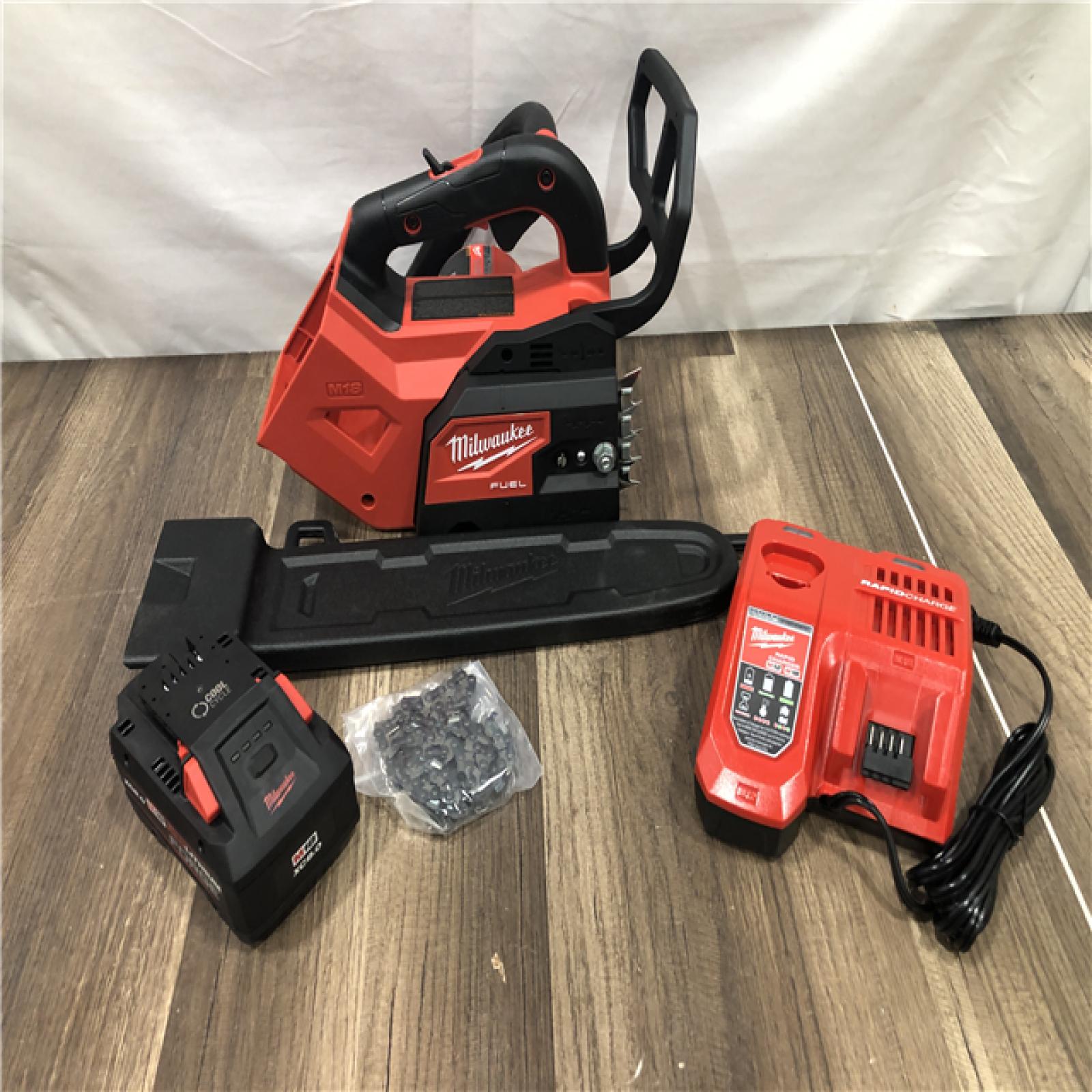 AS-IS Milwaukee FUEL 14 in. 18V Lithium-Ion Brushless Battery Top Handle Chainsaw Kit