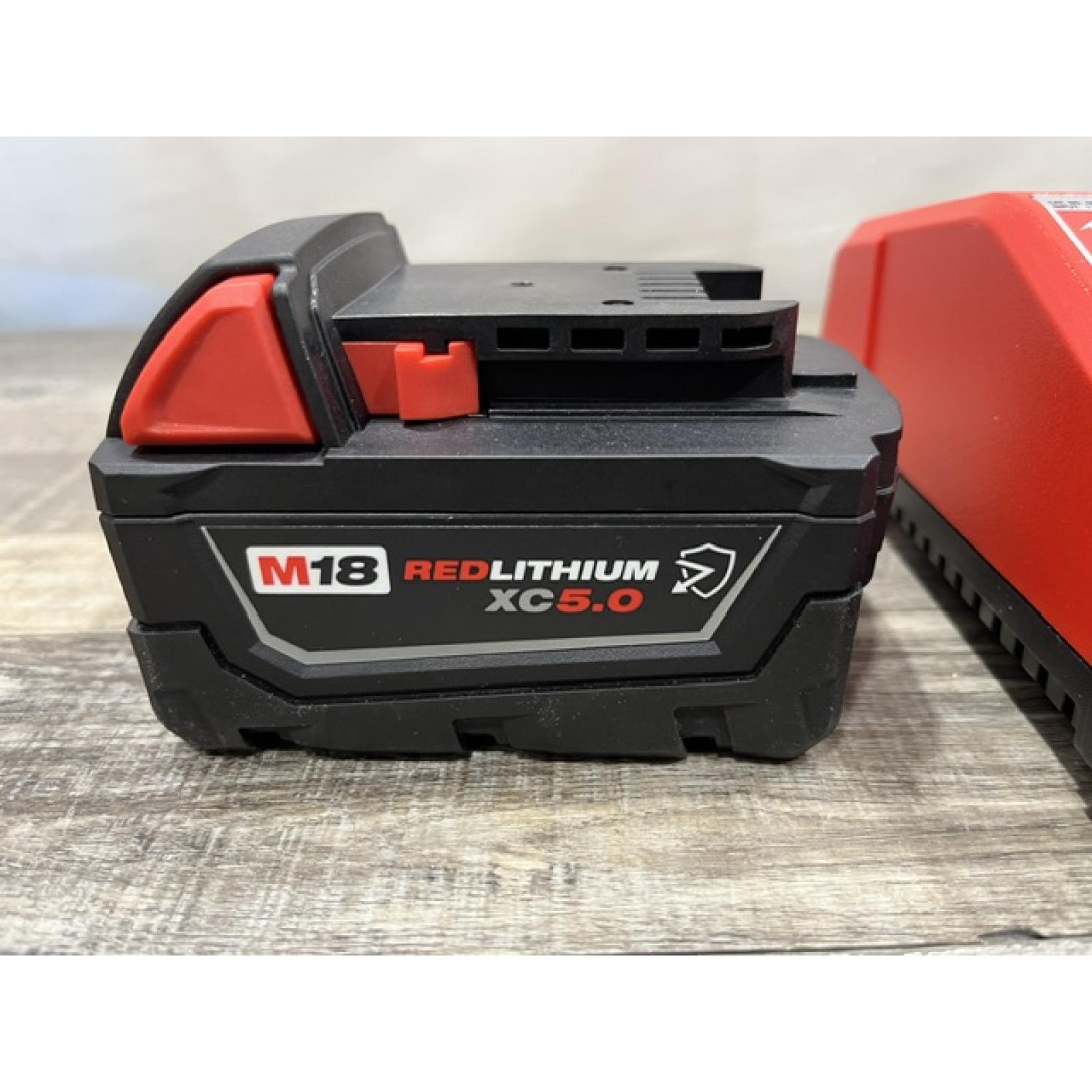 AS-IS Milwaukee 18-Volt Lithium-Ion XC Starter Kit with One 5.0Ah Battery and Charger