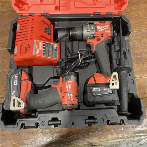 AS-IS MILWAUKEE M18 FUEL 18V Lithium-Ion Brushless Cordless Hammer Drill and Impact Driver Combo Kit (2-Tool) with 2 Batteries