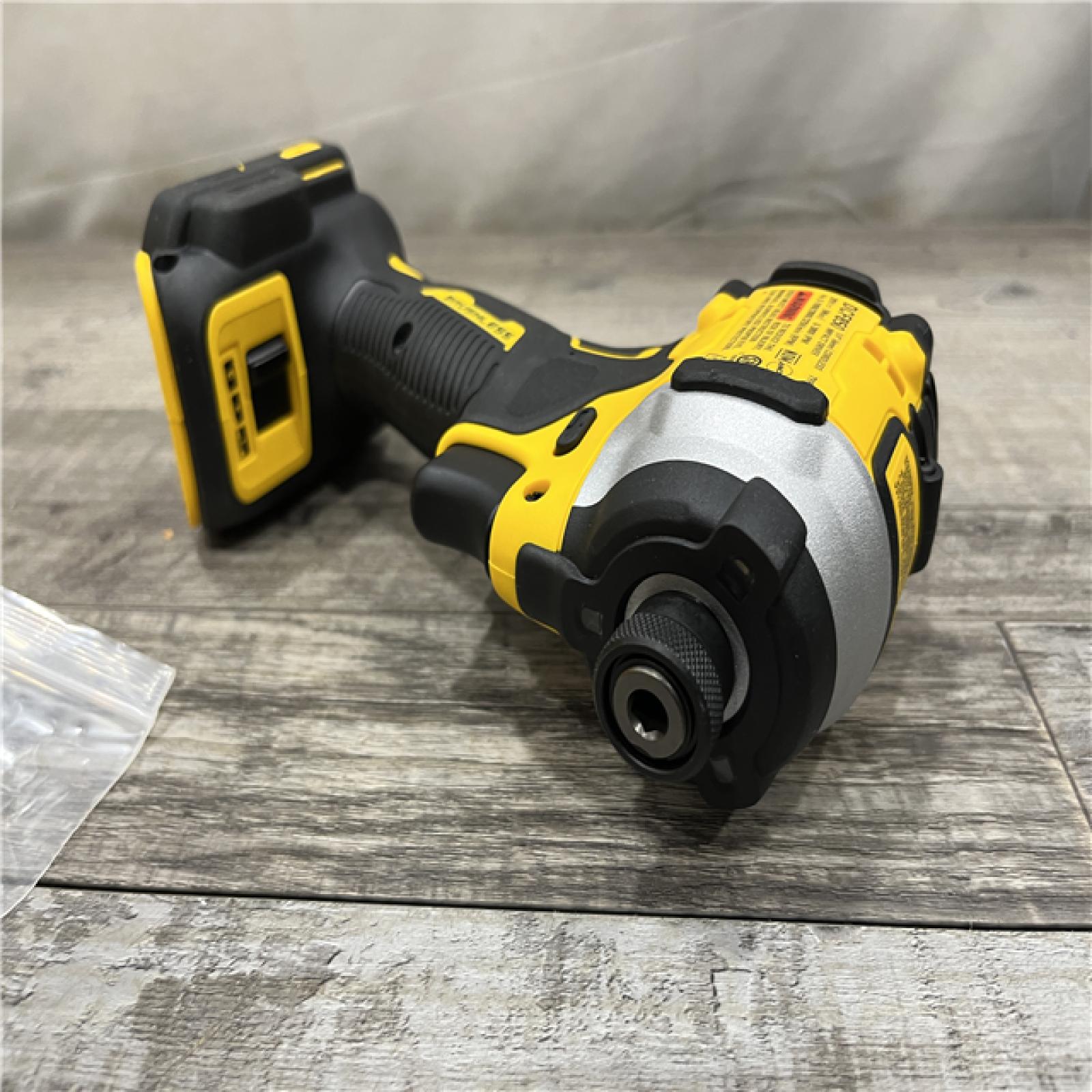 AS-IS DEWALT ATOMIC 20V MAX Cordless Brushless Compact 1/4 in. Impact Driver (Tool Only)