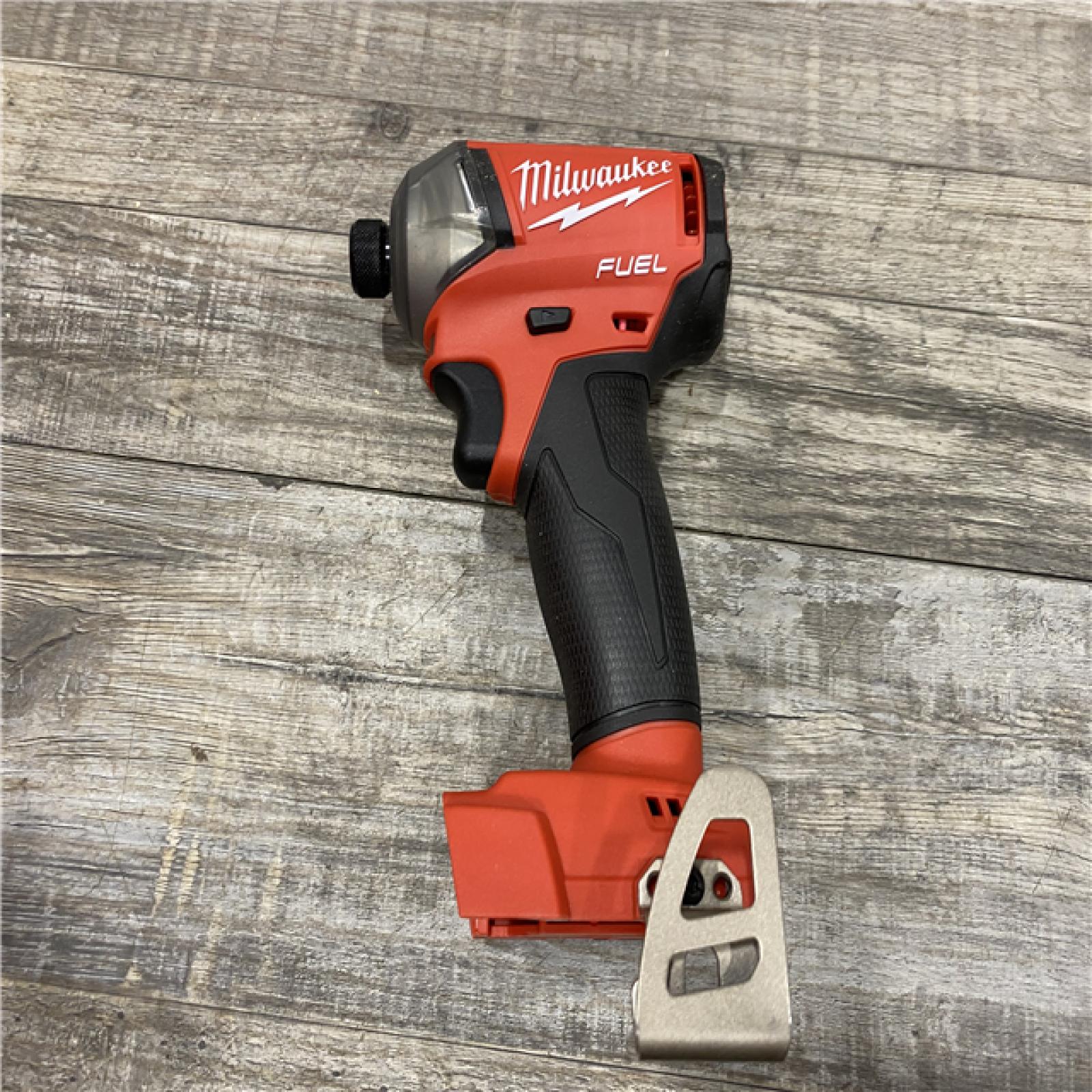 AS-IS Milwaukee FUEL SURGE 18V Lithium-Ion Brushless Cordless 1/4 in. Hex Impact Driver (Tool-Only)