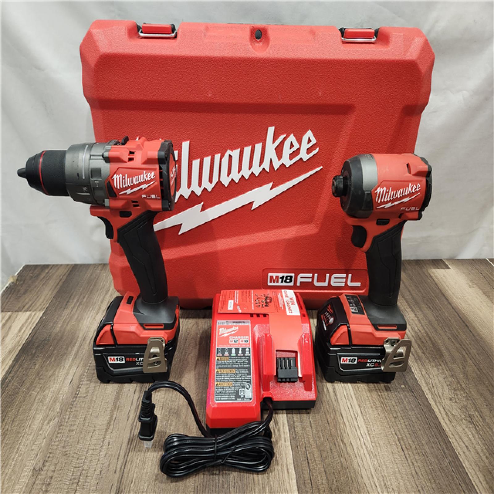 AS-IS- MILWAUKEE FUEL 18V Lithium-Ion Brushless Cordless Hammer Drill and Impact Driver Combo Kit