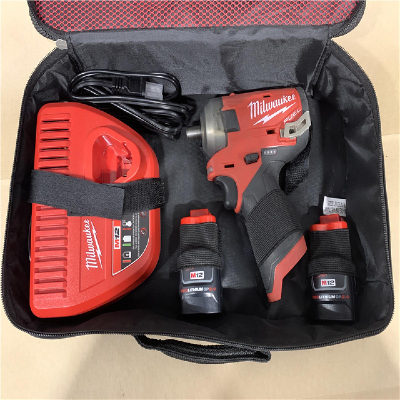 AS-IS - Milwaukee M12 FUEL SURGE 12V Lithium-Ion Brushless Cordless 1/4 in. Hex Impact Driver Compact Kit W/Two 2.0Ah Batteries  Bag