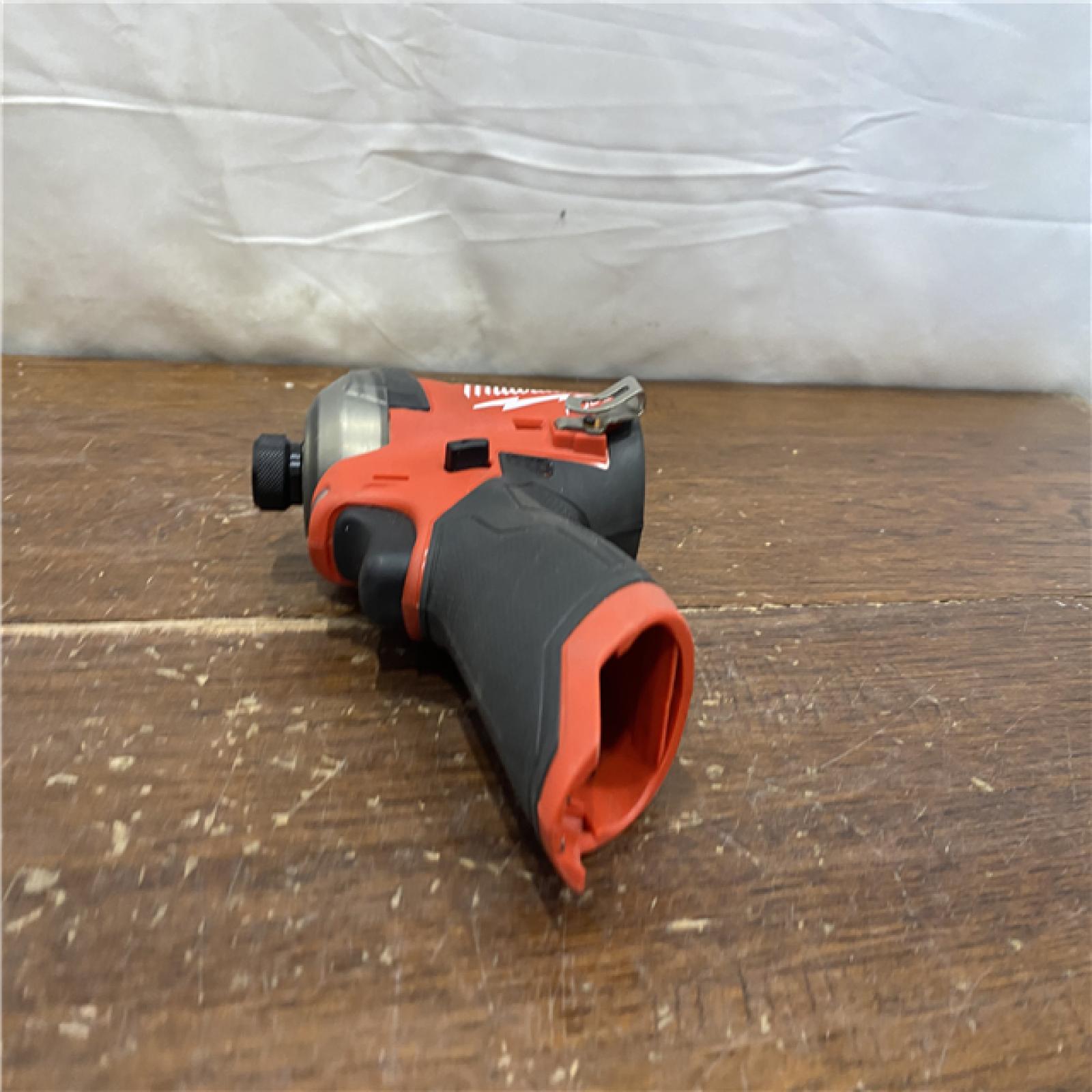 AS-IS M12 FUEL SURGE 12V Lithium-Ion Brushless Cordless 1/4 in. Hex Impact Driver Compact Kit W/Two 2.0Ah Batteries, Bag