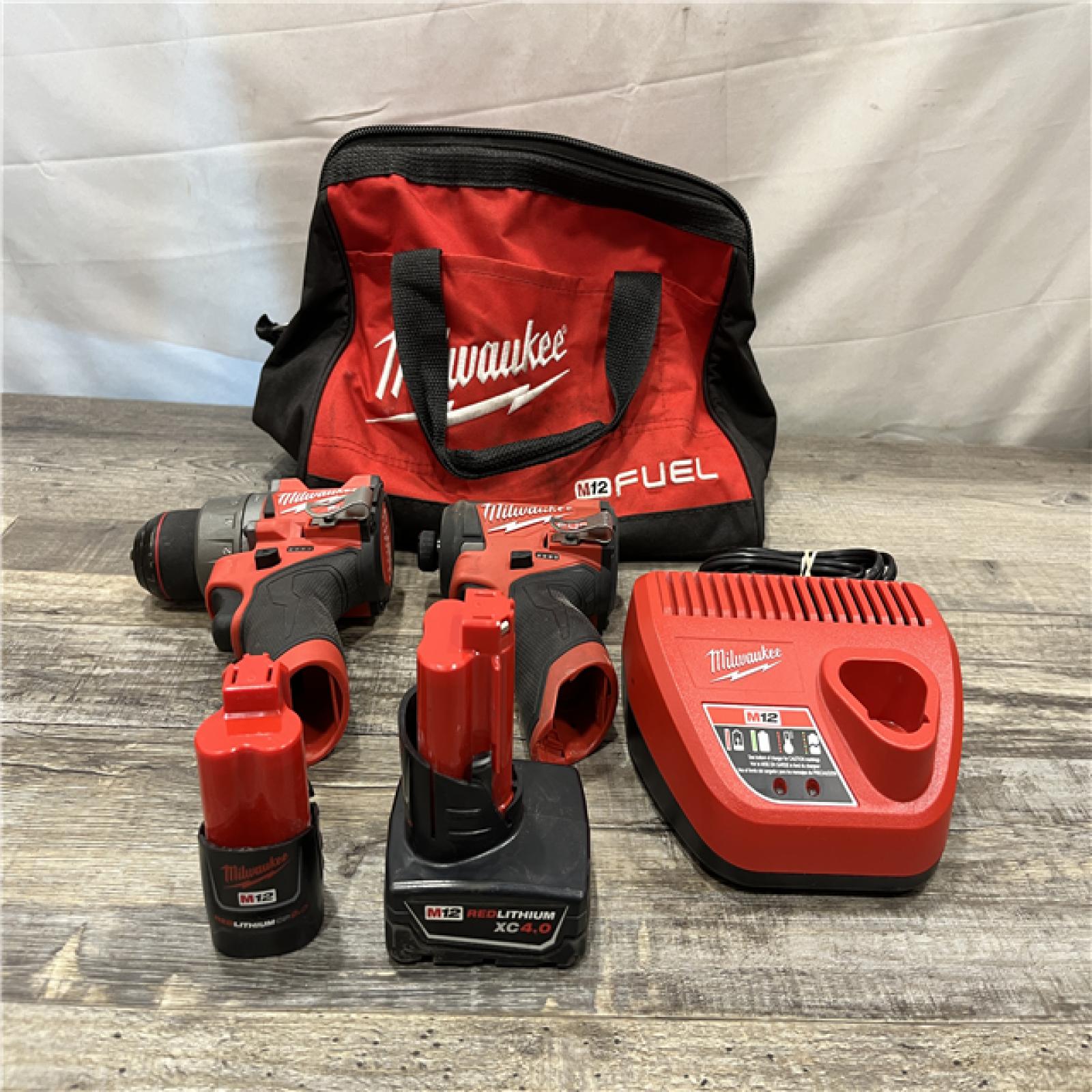 AS-IS Milwaukee FUEL 12-Volt Lithium-Ion Brushless Cordless Hammer Drill and Impact Driver Combo Kit