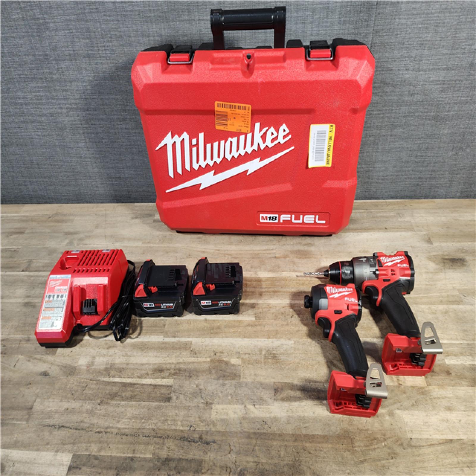 HOUSTON LOCATION - AS-IS MILWAUKEE FUEL 18V Lithium-Ion Brushless Cordless Hammer Drill and Impact Driver Combo Kit