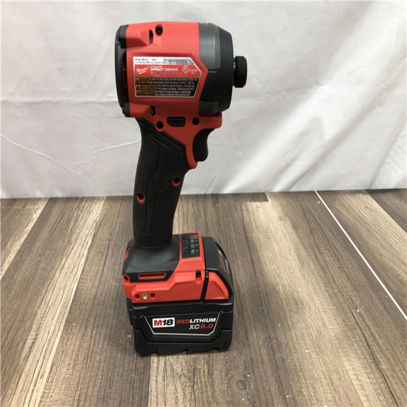 AS-IS Milwaukee  FUEL 18V Lithium-Ion Brushless Cordless 1/4 in. Hex Impact Driver Kit