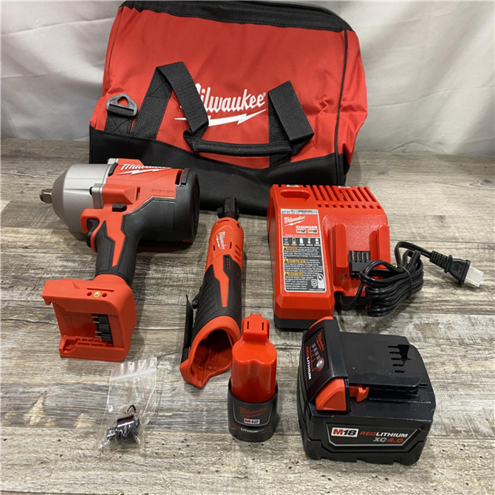 LIKE NEW - Milwaukee 12/18V Lithium-Ion Cordless 3/8 in. Ratchet and 1/2 in. High Torque Impact Wrench with Friction Ring Combo Kit