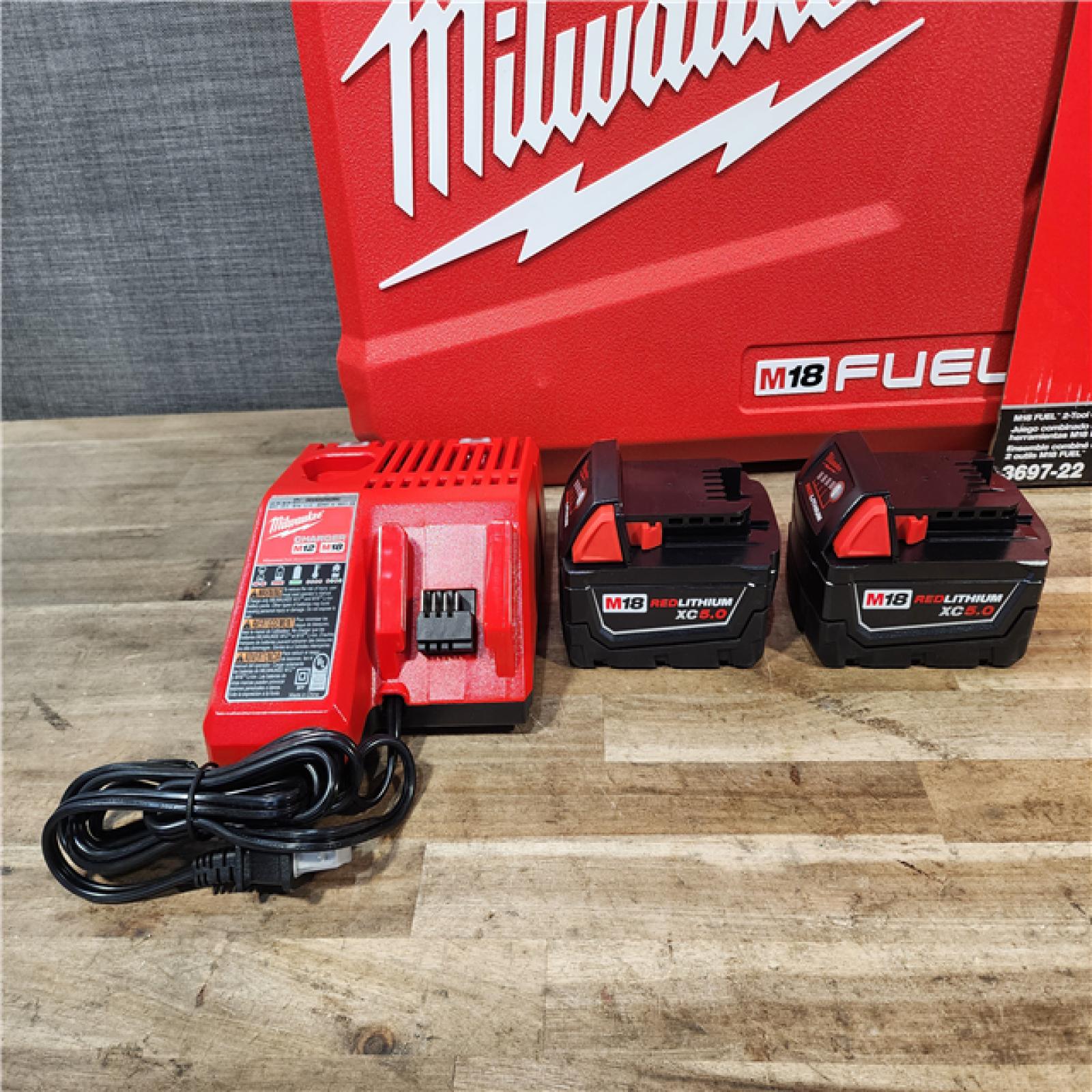 HOUSTON LOCATION - AS-IS Milwaukee  FUEL 18V Lithium-Ion Brushless Cordless Hammer Drill and Impact Driver Combo Kit