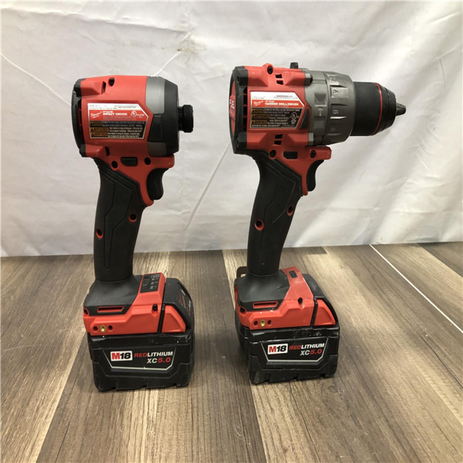 AS-IS Milwaukee FUEL 18V Lithium-Ion Brushless Cordless Hammer Drill and Impact Driver Combo Kit
