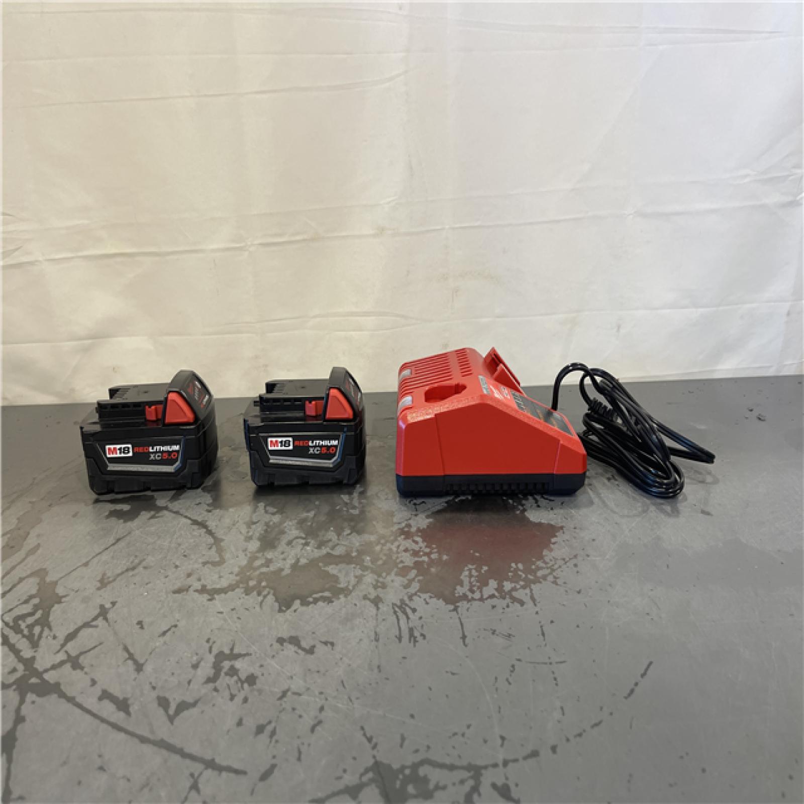 AS-IS- M18 18-Volt Lithium-Ion XC Starter Kit with Two 5.0Ah Batteries and Charger