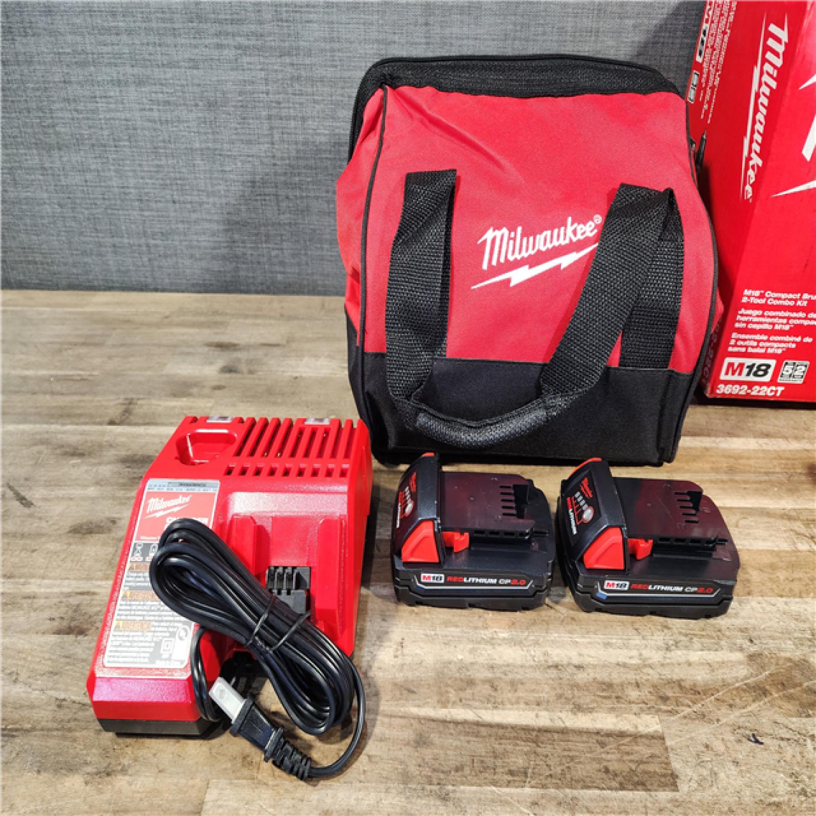 HOUSTON LOCATION - AS-IS Milwaukee M18 18V Lithium-Ion Brushless Cordless Compact Drill/Impact Combo Kit (2-Tool) W/(2) 2.0 Ah Batteries  Charger & Bag