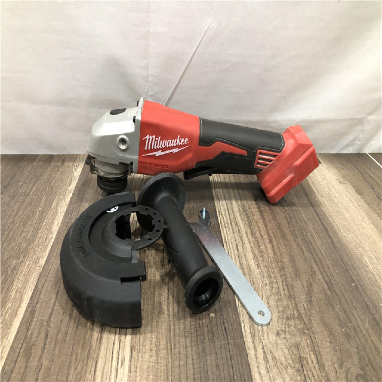 AS-IS Milwaukee 18V Lithium-Ion Brushless Cordless 4-1/2 in./5 in. Grinder w/Paddle Switch (Tool-Only)
