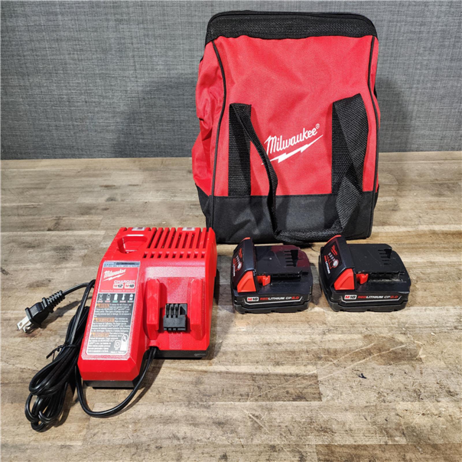 HOUSTON LOCATION - AS-IS Milwaukee M18 18V Lithium-Ion Brushless Cordless Compact Drill/Impact Combo Kit (2-Tool) W/(2) 2.0 Ah Batteries  Charger & Bag