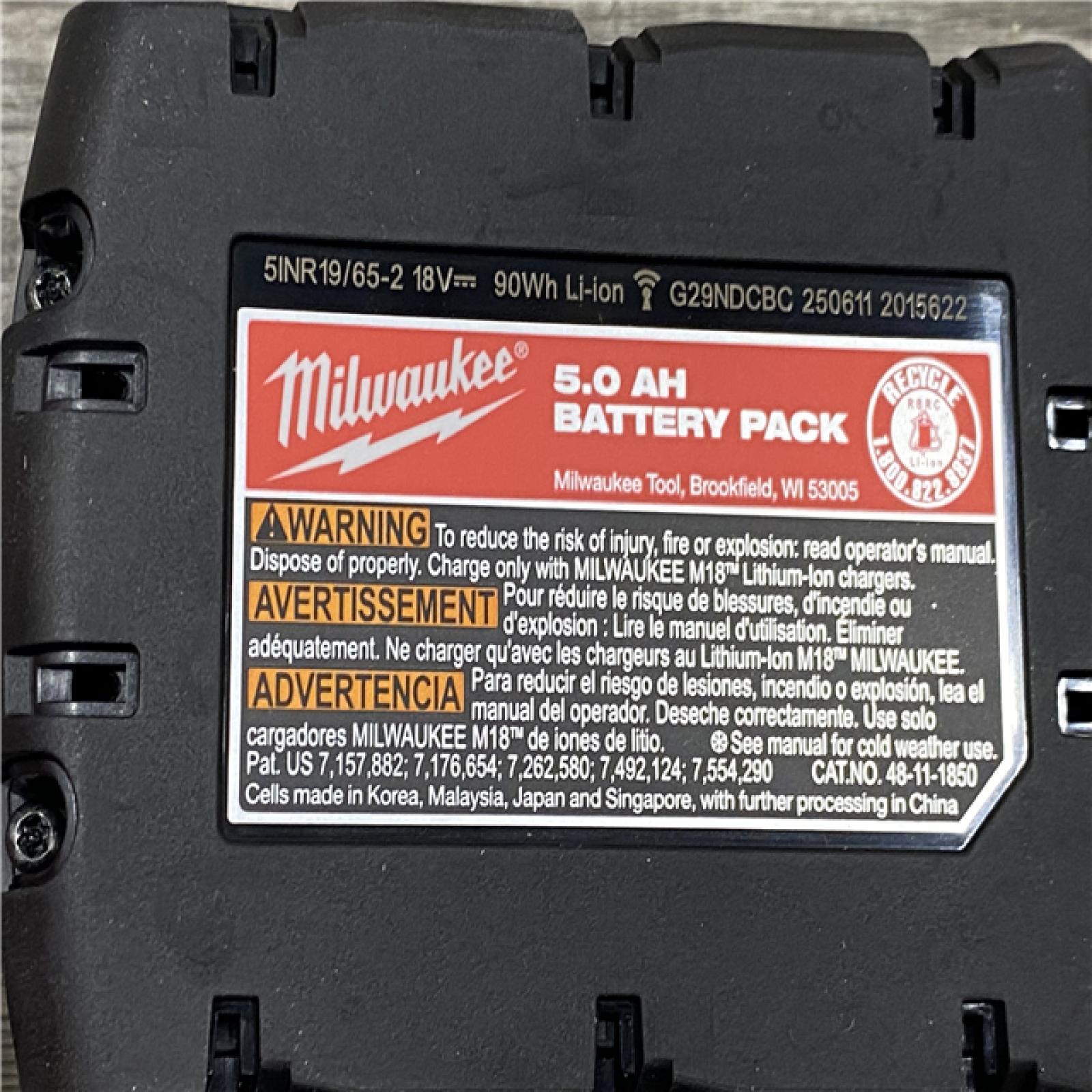 AS-IS Milwaukee 18-Volt Lithium-Ion XC Starter Kit with Two 5.0Ah Batteries and Charger