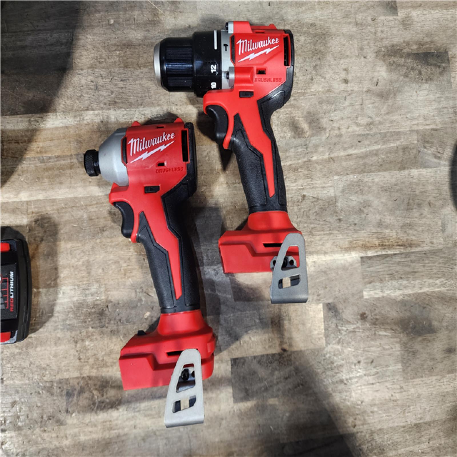 HOUSTON LOCATION - AS-IS M18 18-Volt Lithium-Ion Brushless Cordless Compact Hammer Drill/Impact Combo Kit (2-Tool) with (2) Batteries  Bag