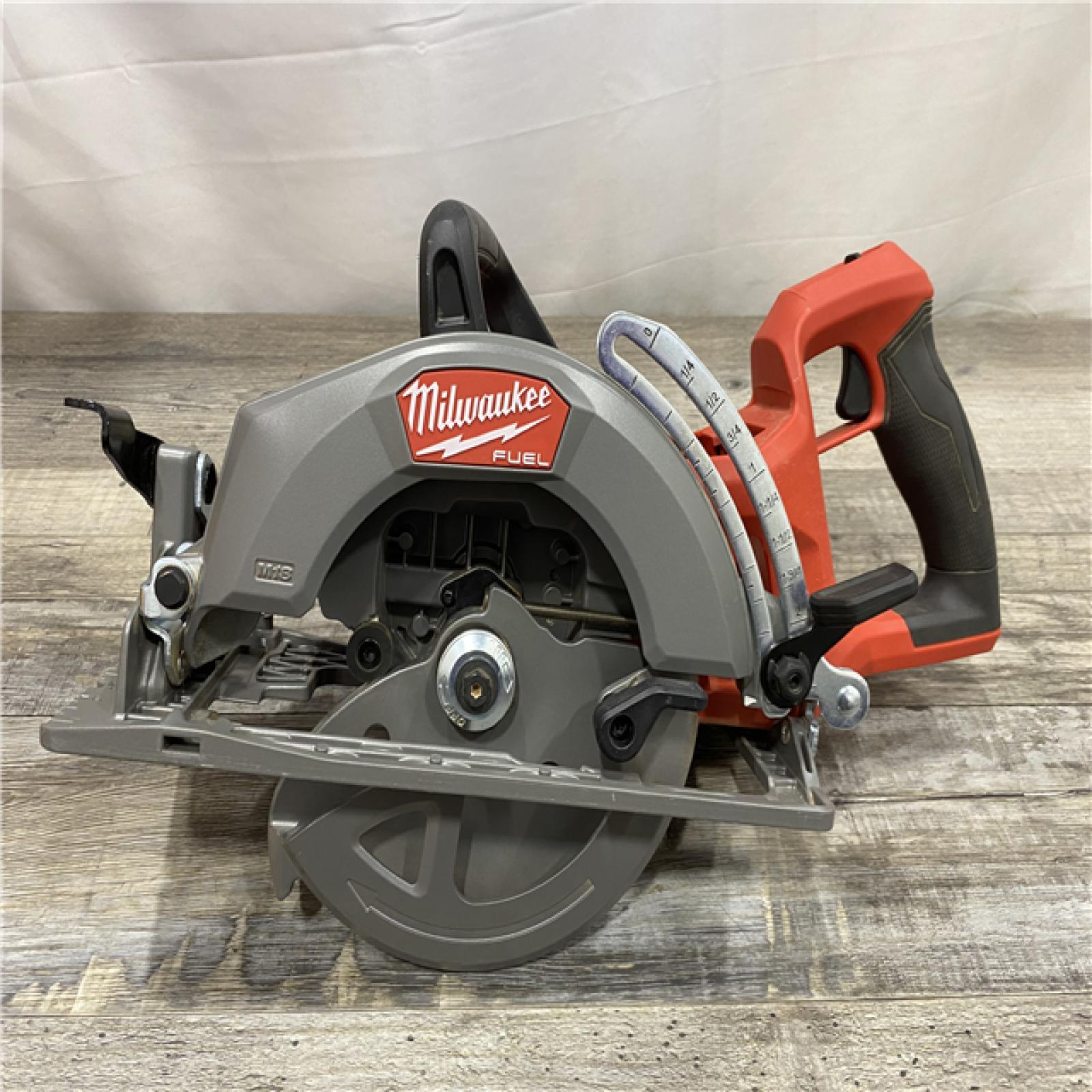 AS-IS Milwaukee FUEL 18V Lithium-Ion Cordless 7-1/4 in. Rear Handle Circular Saw (Tool-Only)