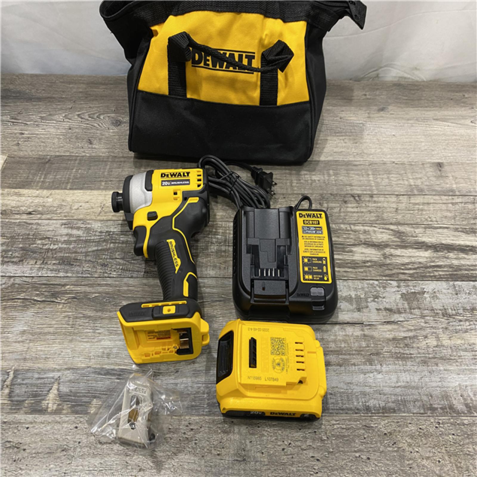 AS-IS DEWALT Atomic 20V Max Lithium-Ion Brushless Cordless Compact 1/4 in. Impact Driver Kit