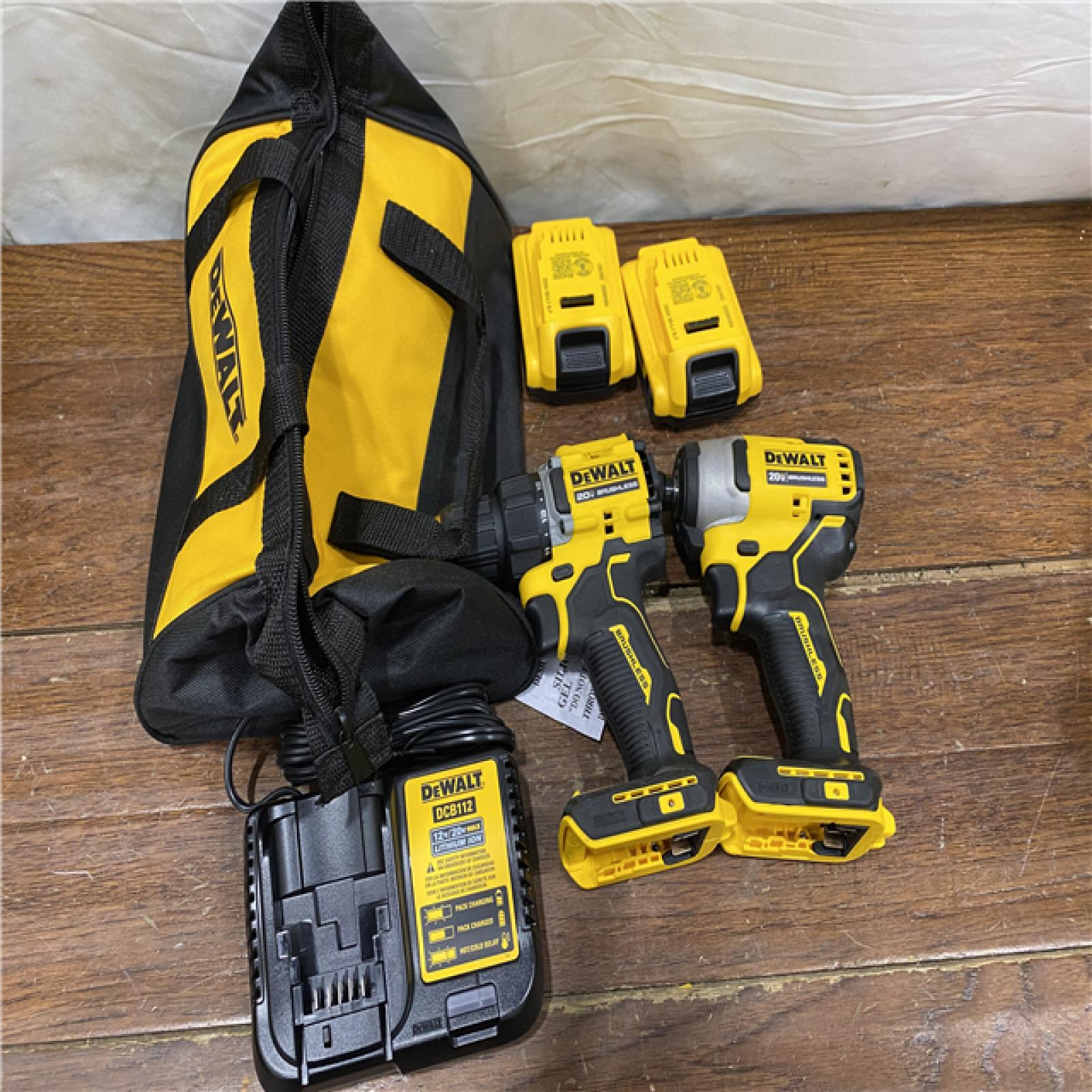 AS-IS DEWALT ATOMIC 20-Volt MAX Lithium-Ion Cordless Combo Kit (2-Tool) with (2) 2.0Ah Batteries, Charger and Bag