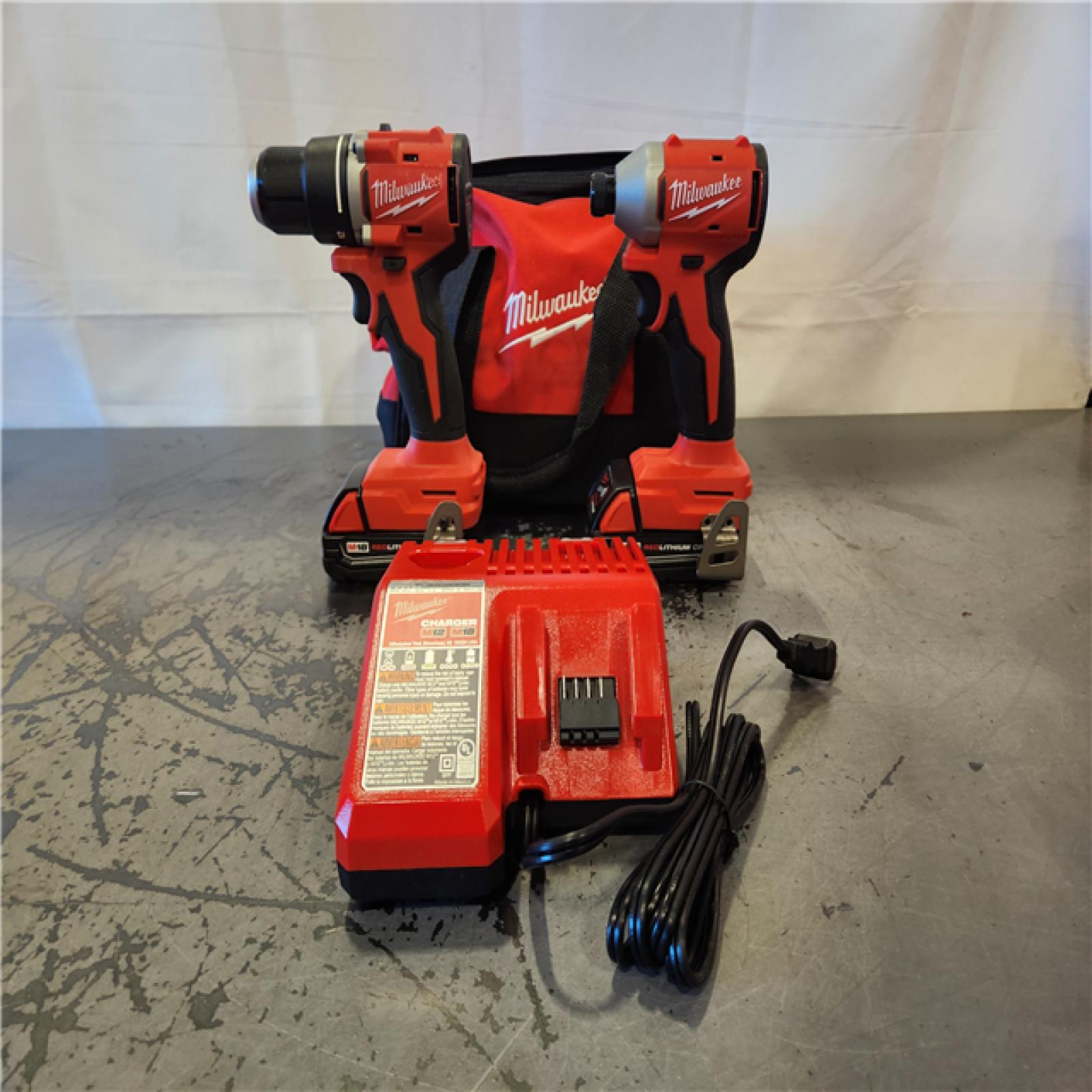 AS-IS- Milwaukee M18 18V Lithium-Ion Brushless Cordless Compact Drill/Impact Combo Kit