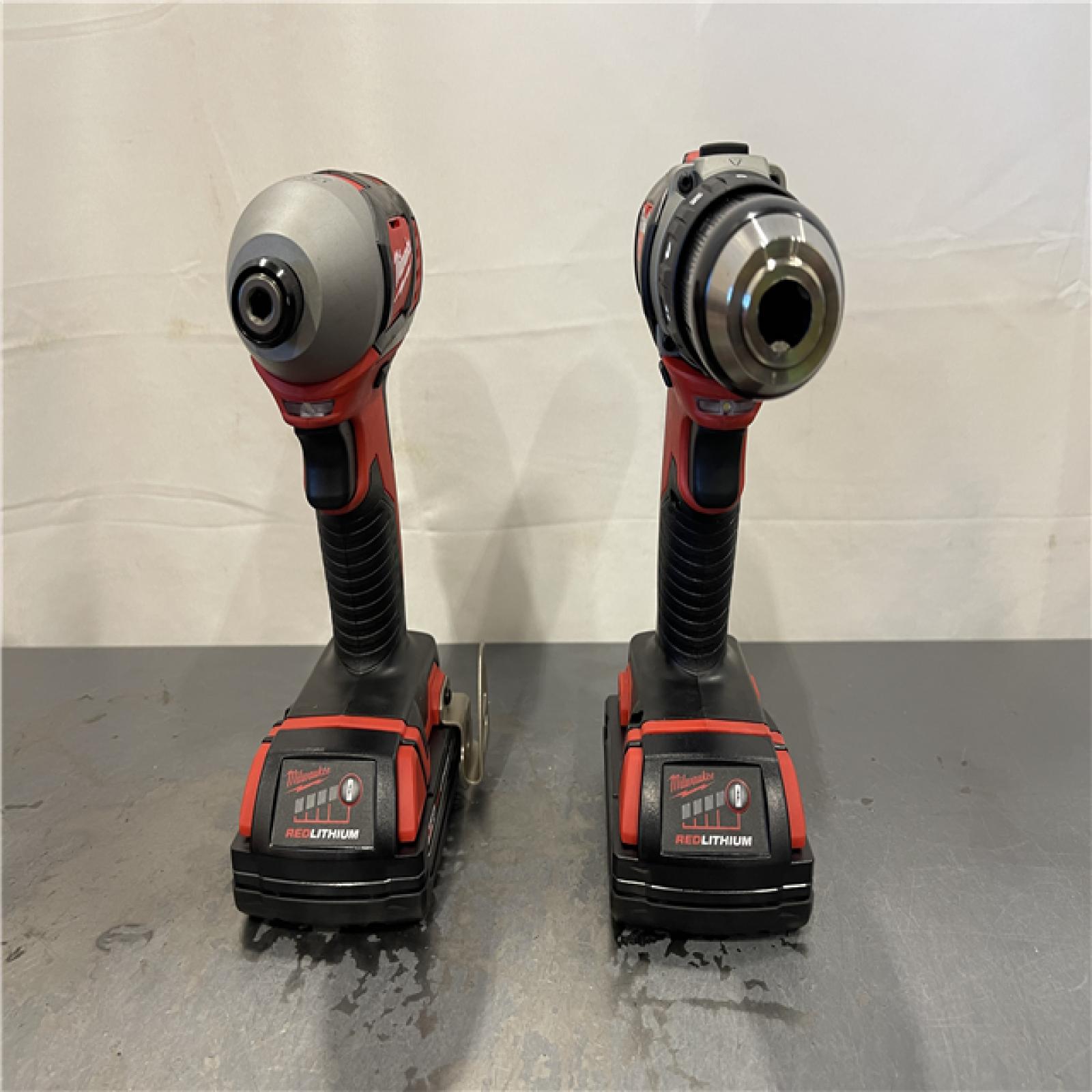 AS-IS - Milwaukee M18 18V Lithium-Ion Cordless Drill Driver/Impact Driver Combo Kit (2-Tool)