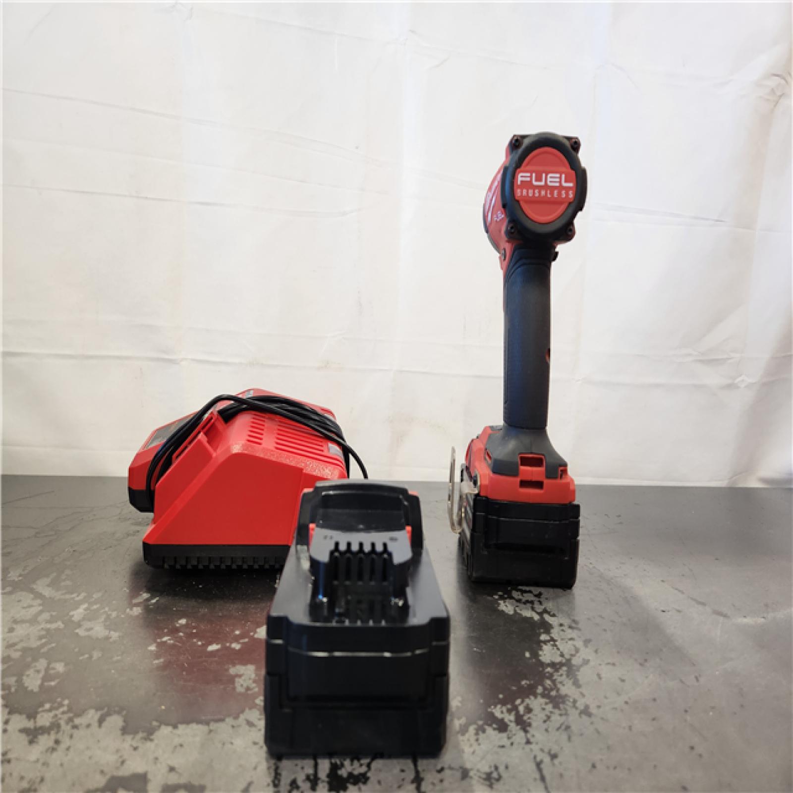 AS-IS- Milwaukee 18-Volt Lithium-Ion XC Starter Kit with Two 5.0Ah Batteries and Charger