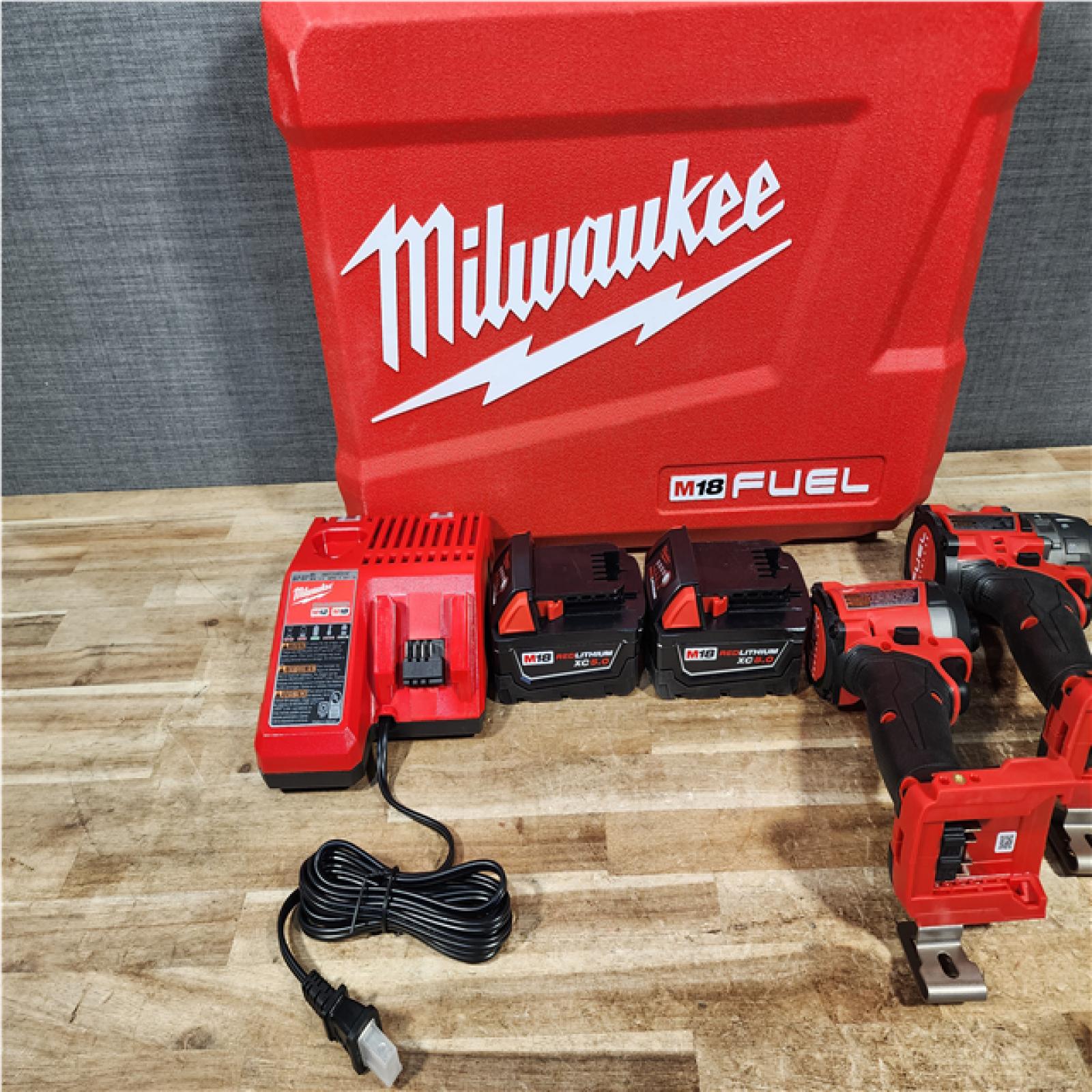 HOUSTON LOCATION - AS - IS Milwaukee FUEL 18V Lithium-Ion Brushless Cordless Hammer Drill and Impact Driver Combo Kit