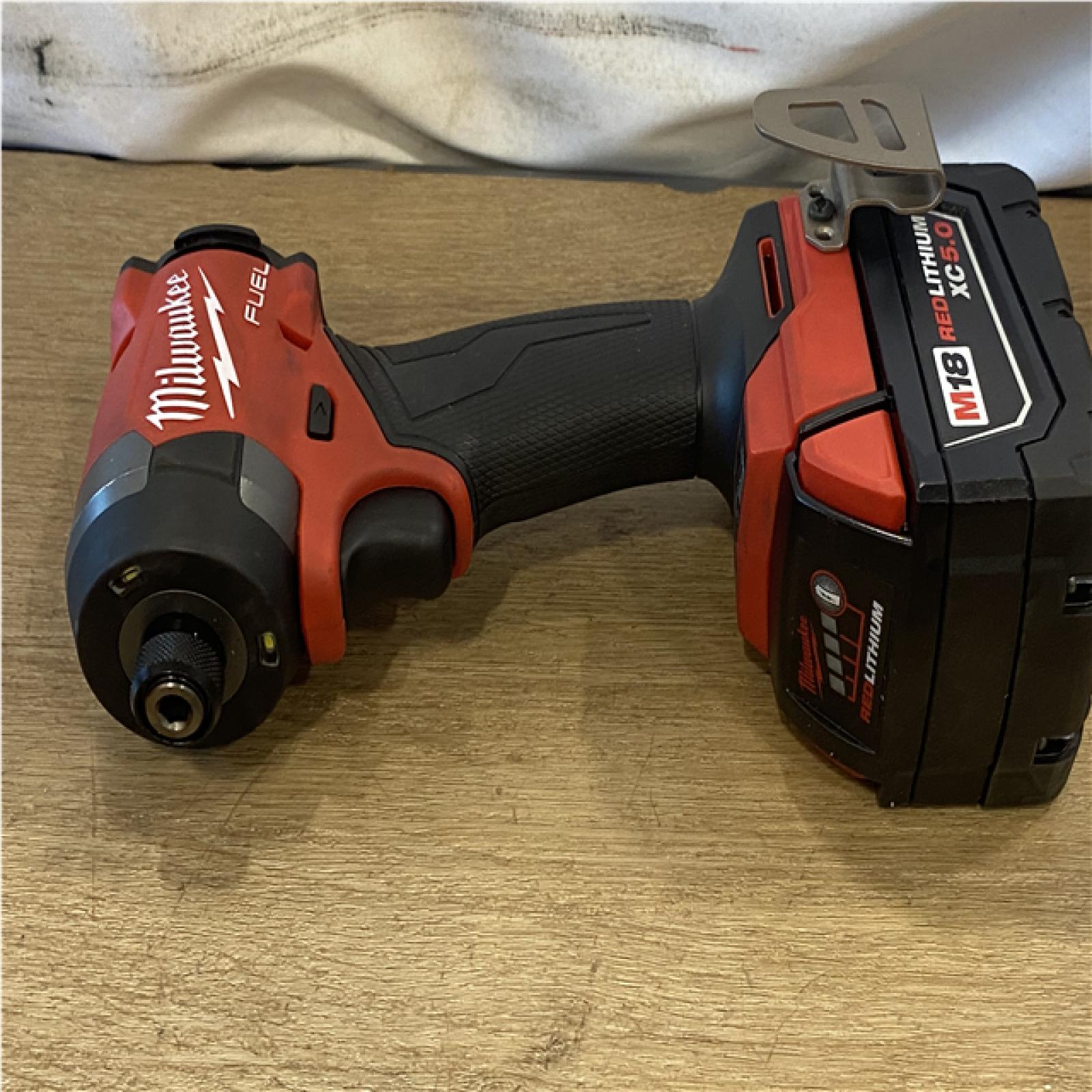 AS-IS Milwaukee FUEL 18V Lithium-Ion Brushless Cordless Hammer Drill and Impact Driver Combo Kit