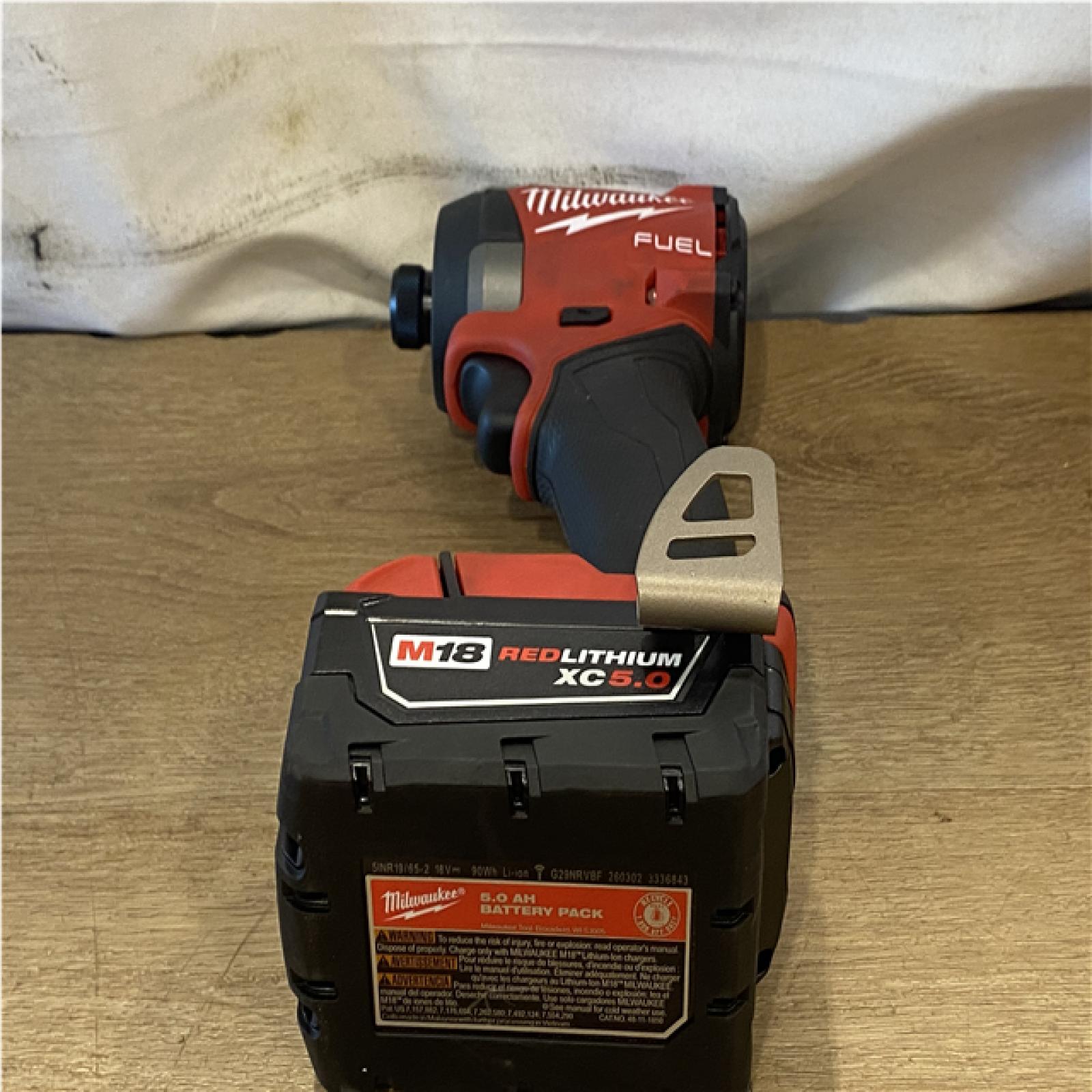 AS-IS Milwaukee FUEL 18V Lithium-Ion Brushless Cordless Hammer Drill and Impact Driver Combo Kit