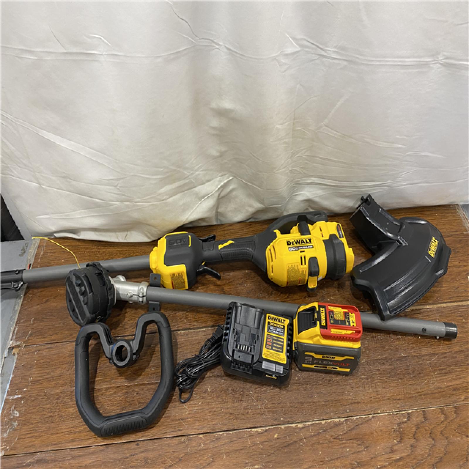 AS-IS DEWALT FLEXVOLT 60V MAX 17 in. Cordless Battery Powered Attachment Capable Trimmer Kit with (1) FLEXVOLT 3 Ah Battery & Charger