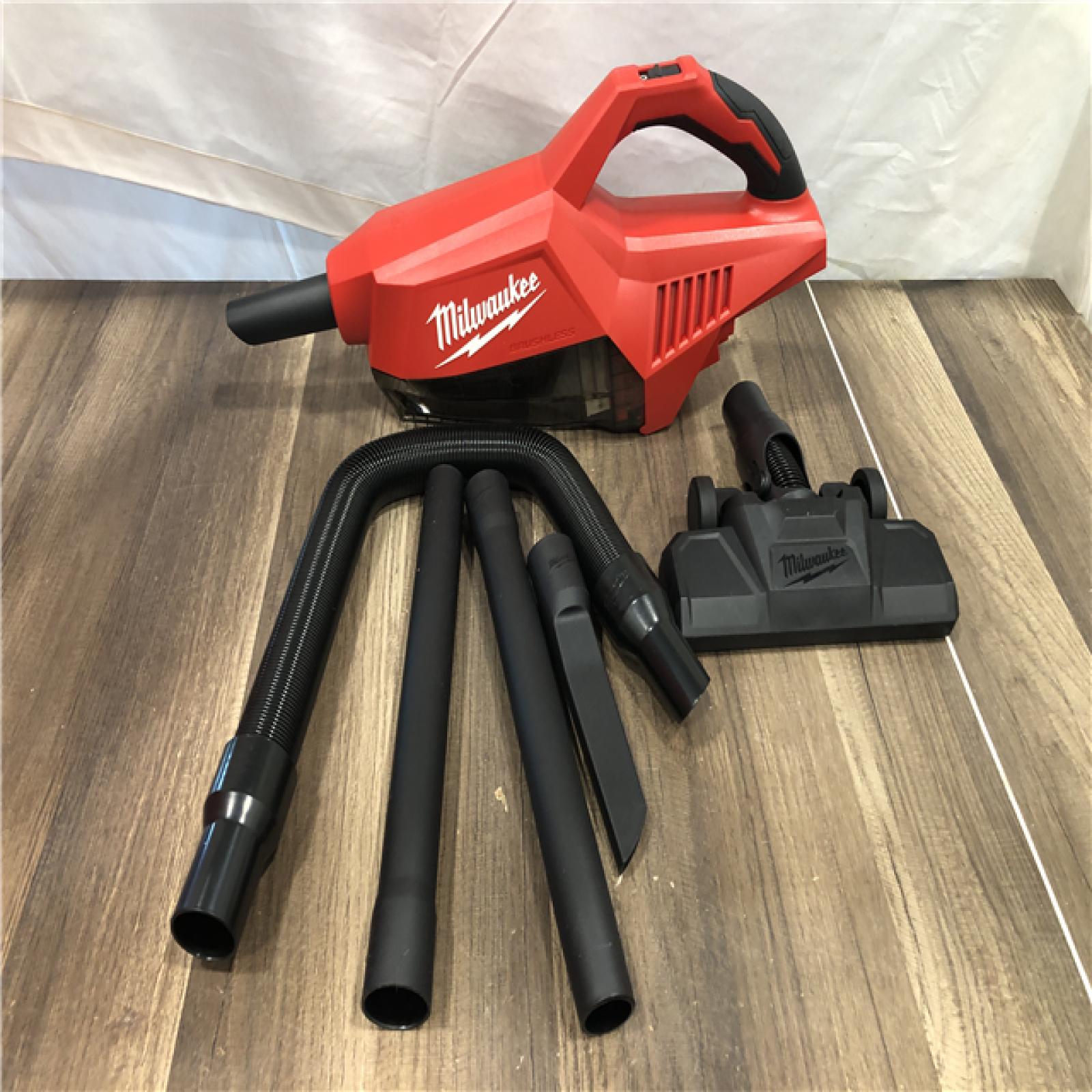 AS-IS  Milwaukee 18-Volt Lithium-Ion Brushless Bagless Cordless HEPA Handheld Vacuum