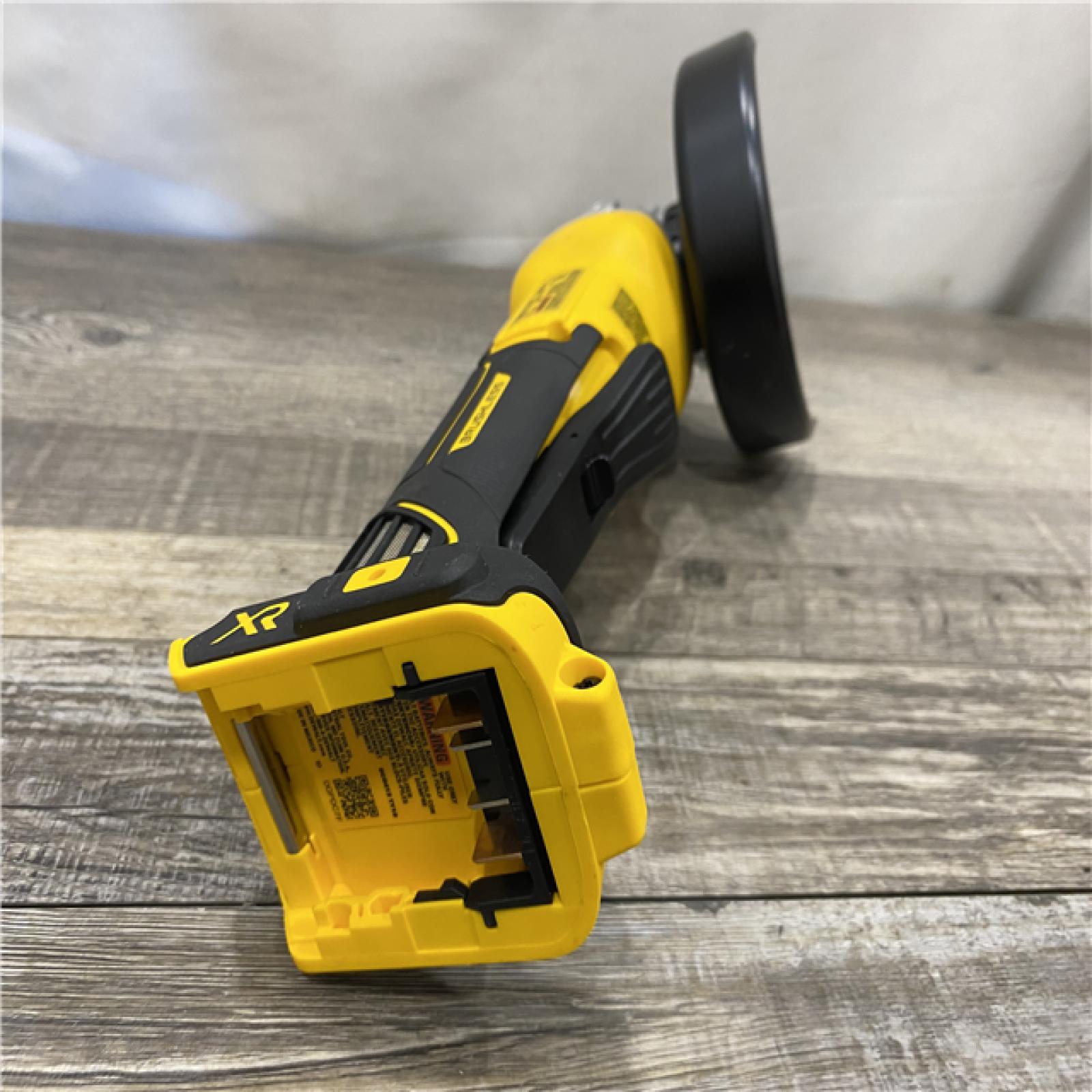 AS-IS DEWALT 20V MAX XR Cordless Brushless 4.5 in. Paddle Switch Small Angle Grinder with Kickback Brake (Tool Only)