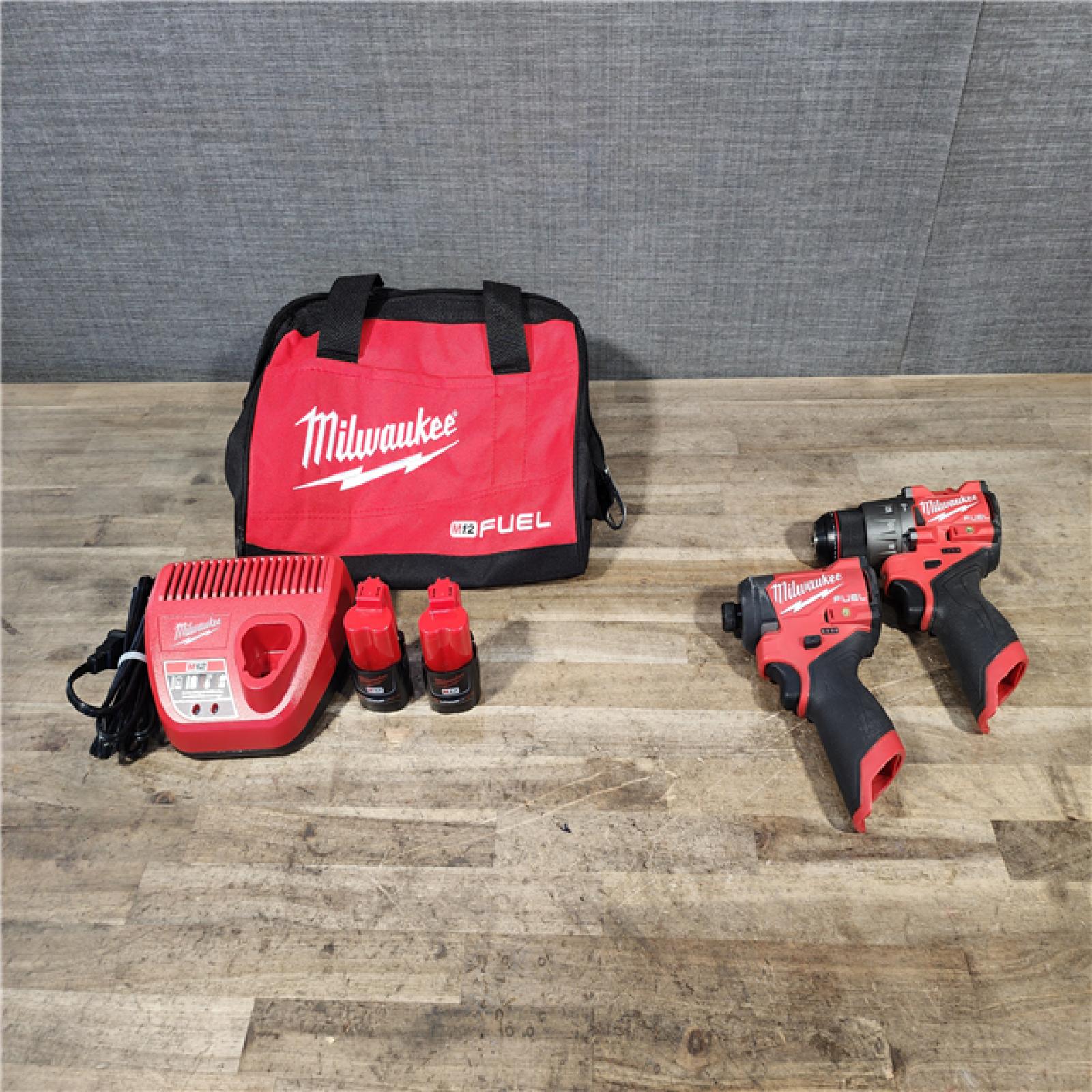 HOUSTON LOCATION - AS-IS Milwaukee FUEL 12-Volt Lithium-Ion Brushless Cordless Hammer Drill and Impact Driver Combo Kit