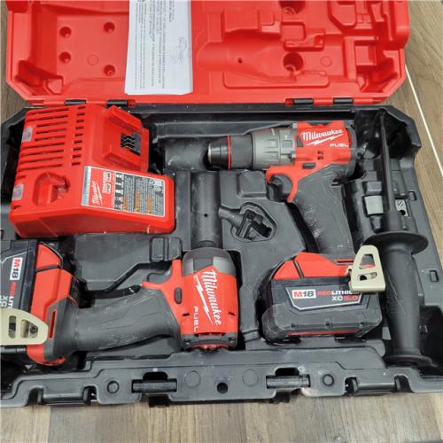 AS-IS MILWAUKEE   M18 FUEL 18V Lithium-Ion Brushless Cordless Hammer Drill and Impact Driver Combo Kit (2-Tool) with 2 Batteries