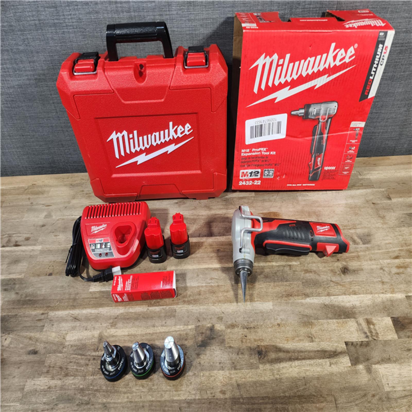 HOUSTON LOCATION - AS-IS (APPEARS LIKE NEW) Milwaukee M12 12-Volt Lithium-Ion Cordless ProPEX Expansion Tool Kit with (2) 1.5Ah Batteries, (3) Expansion Heads and Hard Case