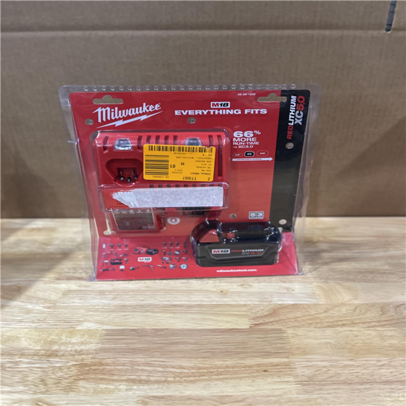NEW!- Milwaukee 18-Volt Lithium-Ion XC Starter Kit with One 5.0Ah Battery and Charger