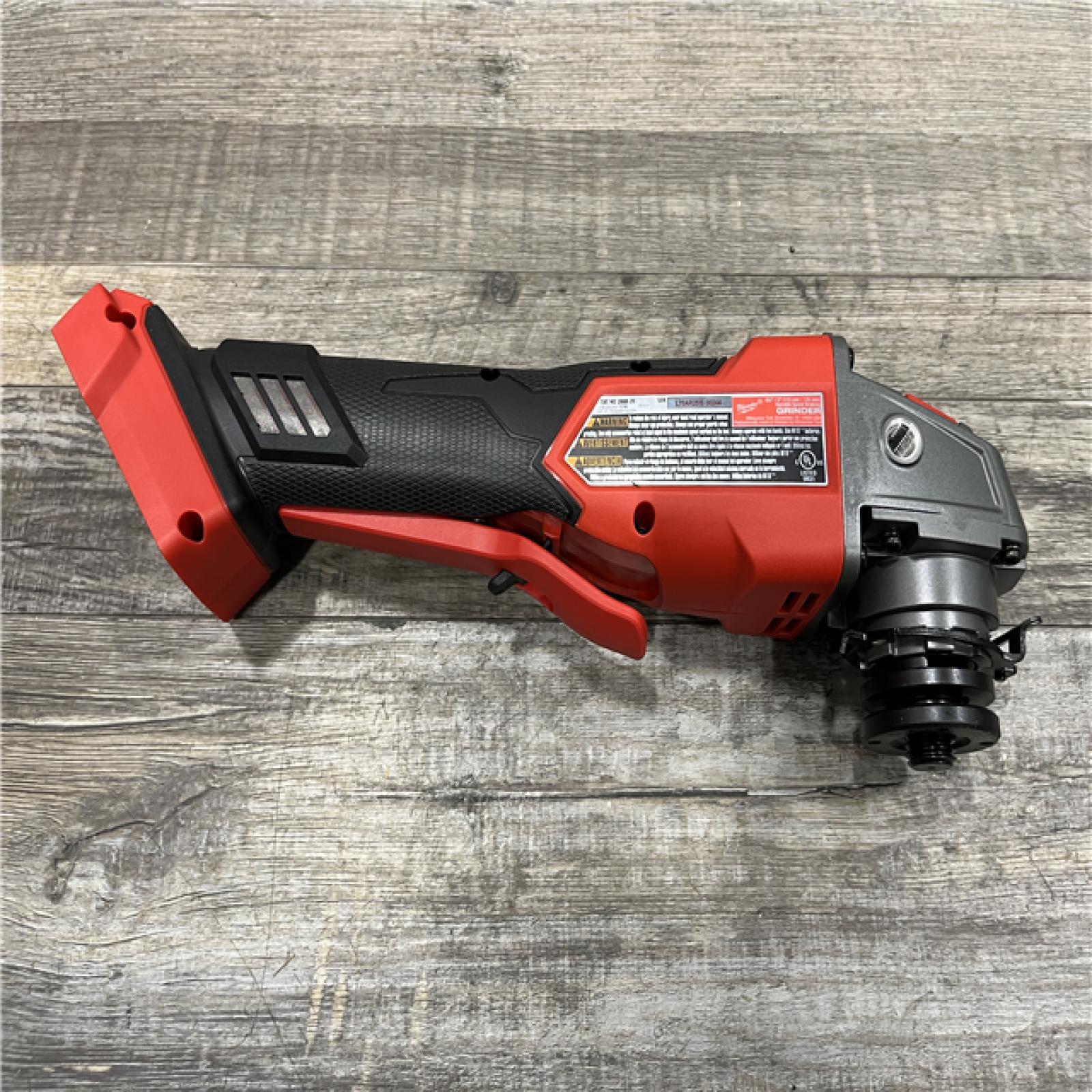 AS-IS Milwaukee FUEL 18V Lithium-Ion Brushless Cordless 4-1/2 in./5 in. Grinder with Variable Speed & Paddle Switch (Tool-Only)