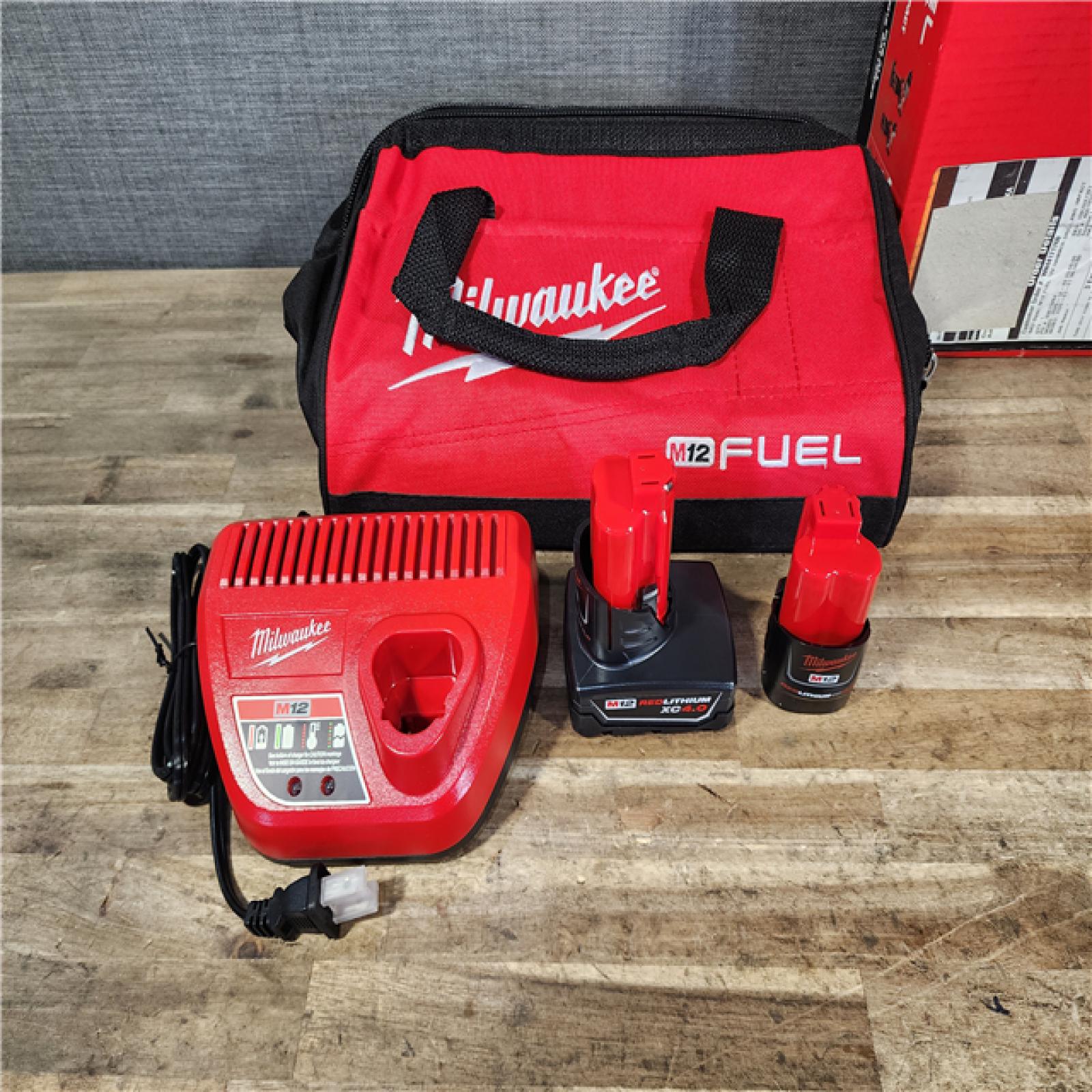 HOUSTON LOCATION - AS-IS Milwaukee FUEL 12-Volt Lithium-Ion Brushless Cordless Hammer Drill and Impact Driver Combo Kit