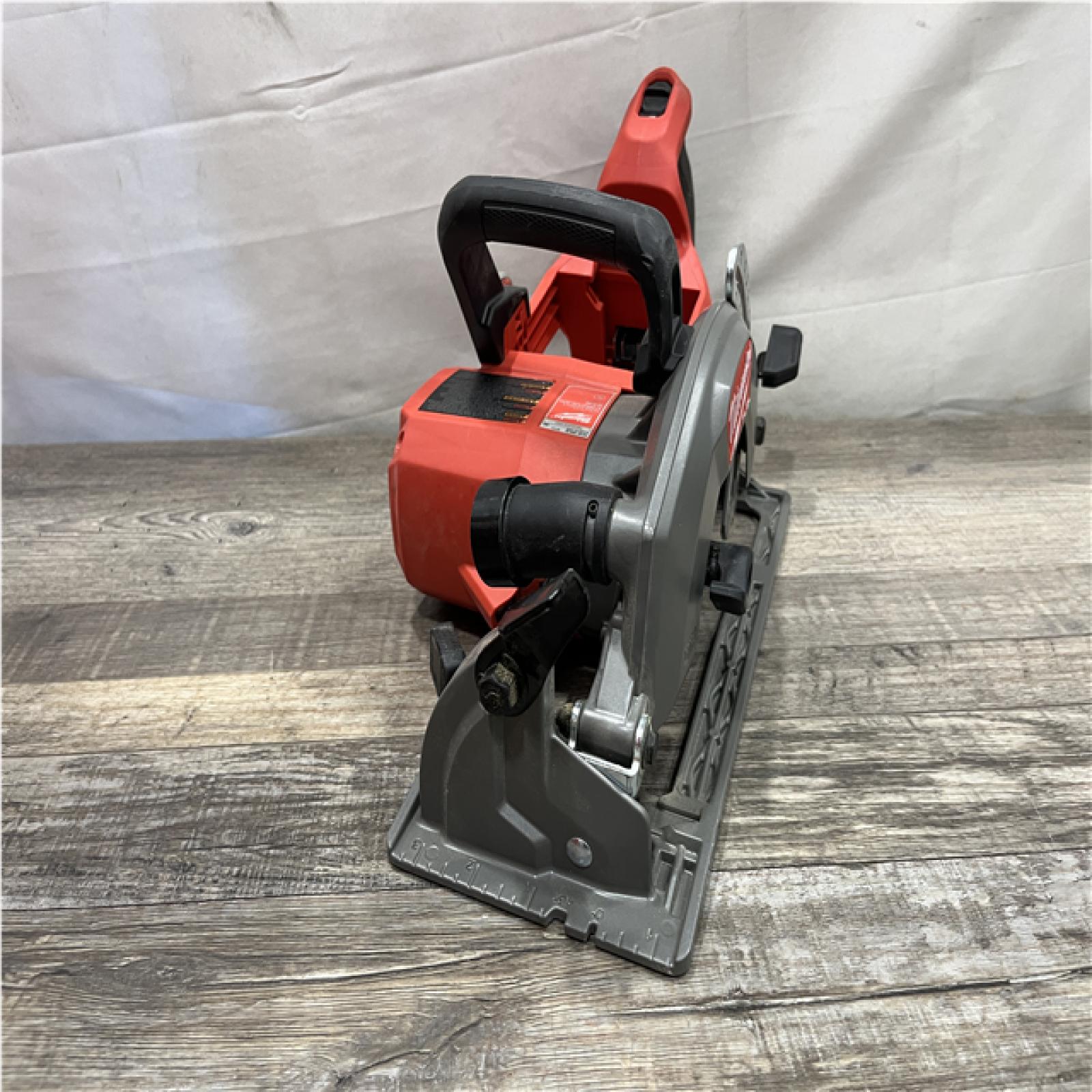 AS-IS Milwaukee FUEL 18V Lithium-Ion Cordless 7-1/4 in. Rear Handle Circular Saw (Tool-Only)