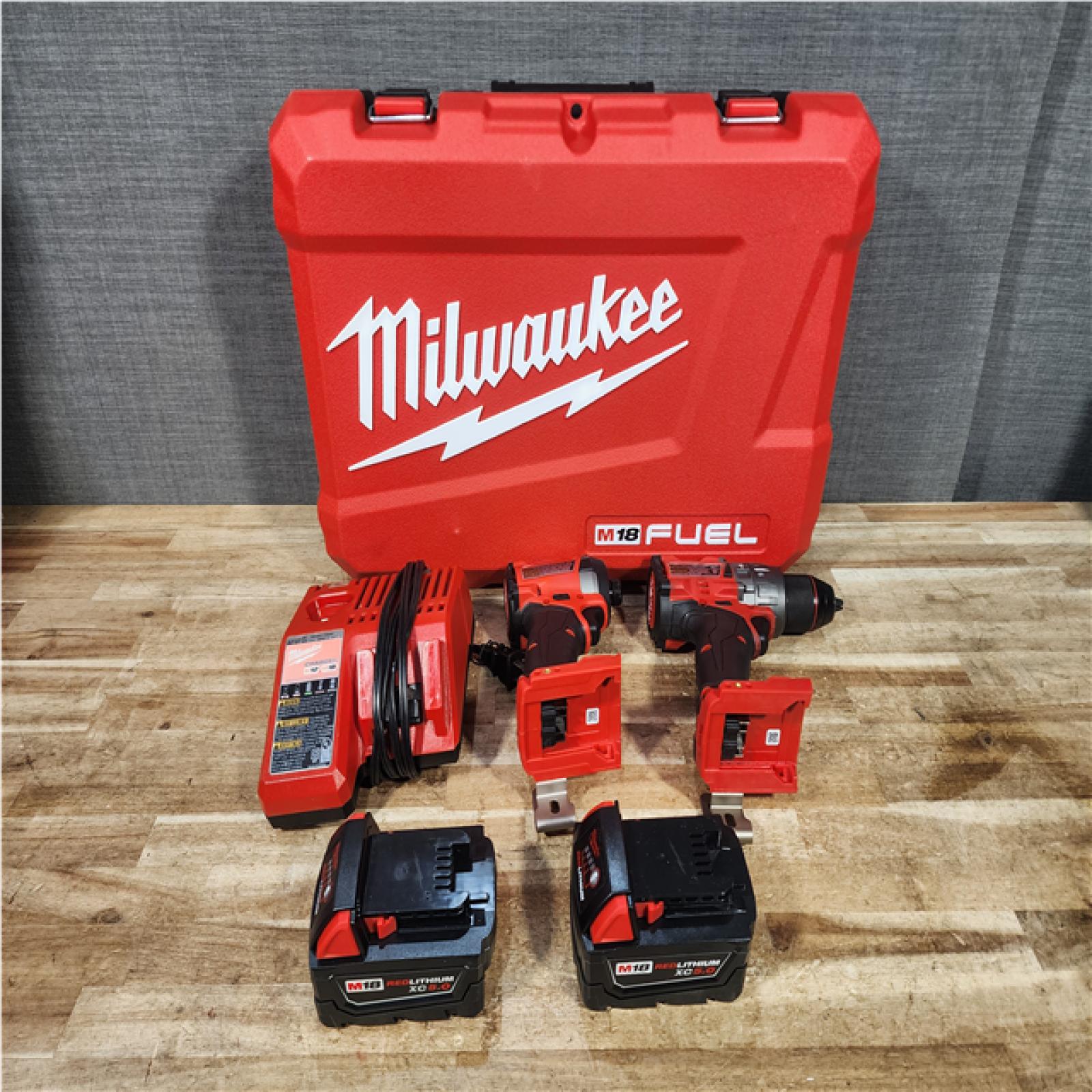 Houston Location AS-IS Milwaukee FUEL 18V Lithium-Ion Brushless Cordless Hammer Drill and Impact Driver Combo Kit